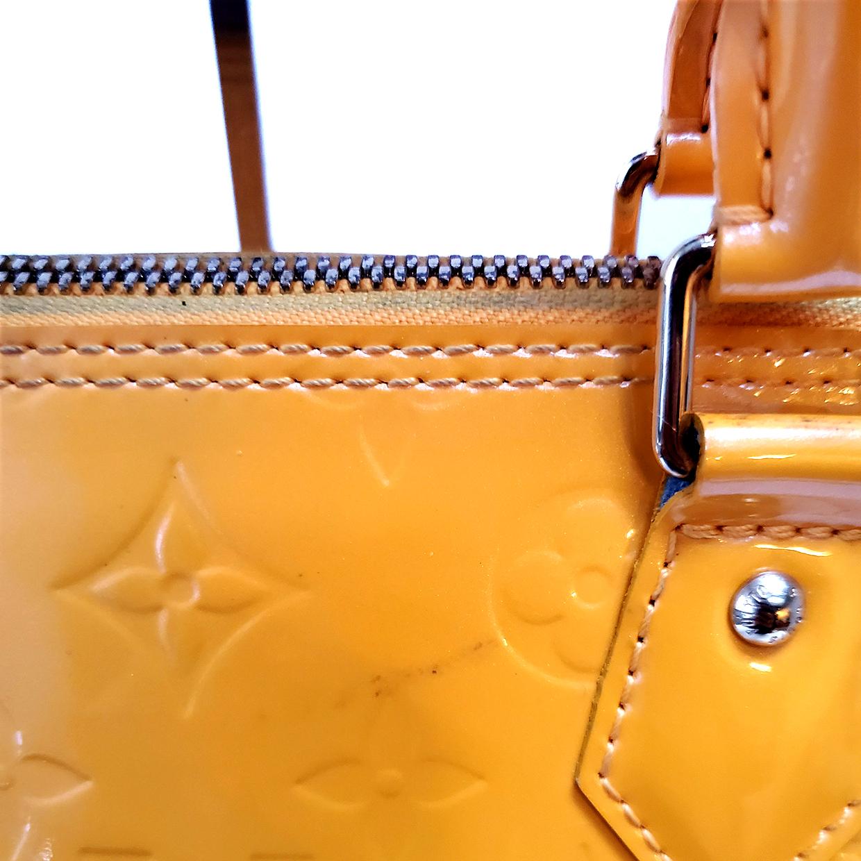 Louis Vuitton Vernis Alma PM Passion Yellow Monogram Hand Bag In Good Condition For Sale In Columbia, MO