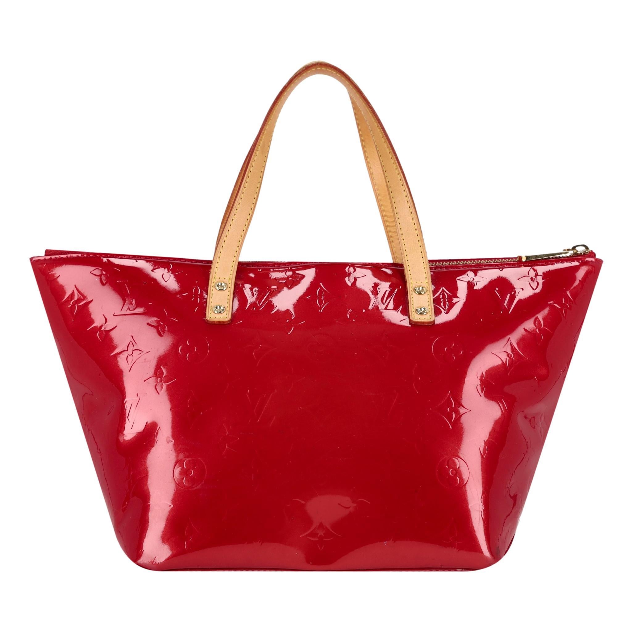 Louis Vuitton Vernis Patent Leather Bellevue Monogram Embossed Tote Bag

Pomme D'Amour - cherry red tote bag crafted of glossy vernis patent leather with LV's monogram embossed.

Featuring beige leather dual top handles gold logo plaque to the