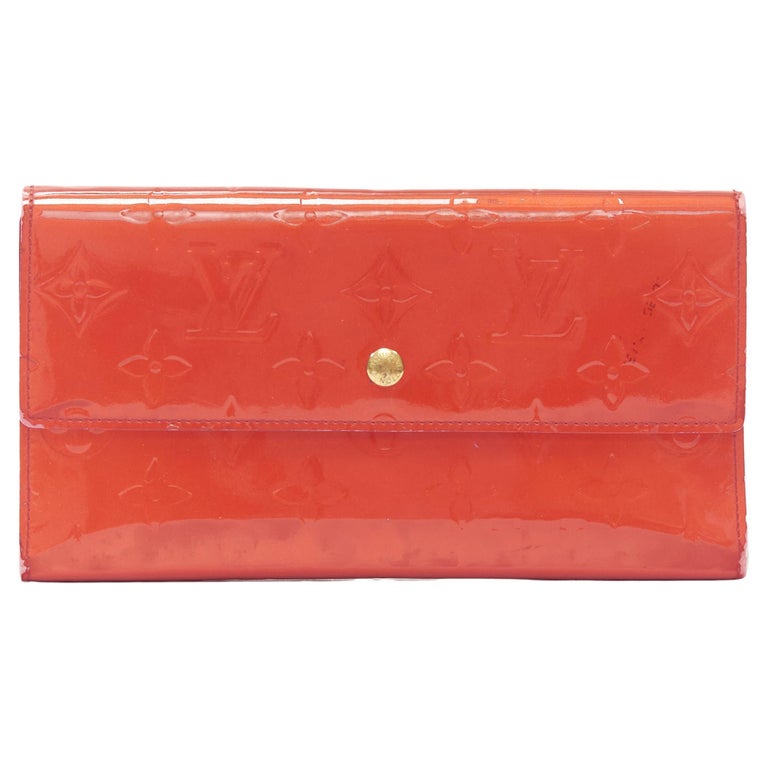 LOUIS VUITTON Vernis red patent LV logo emboss flap continental