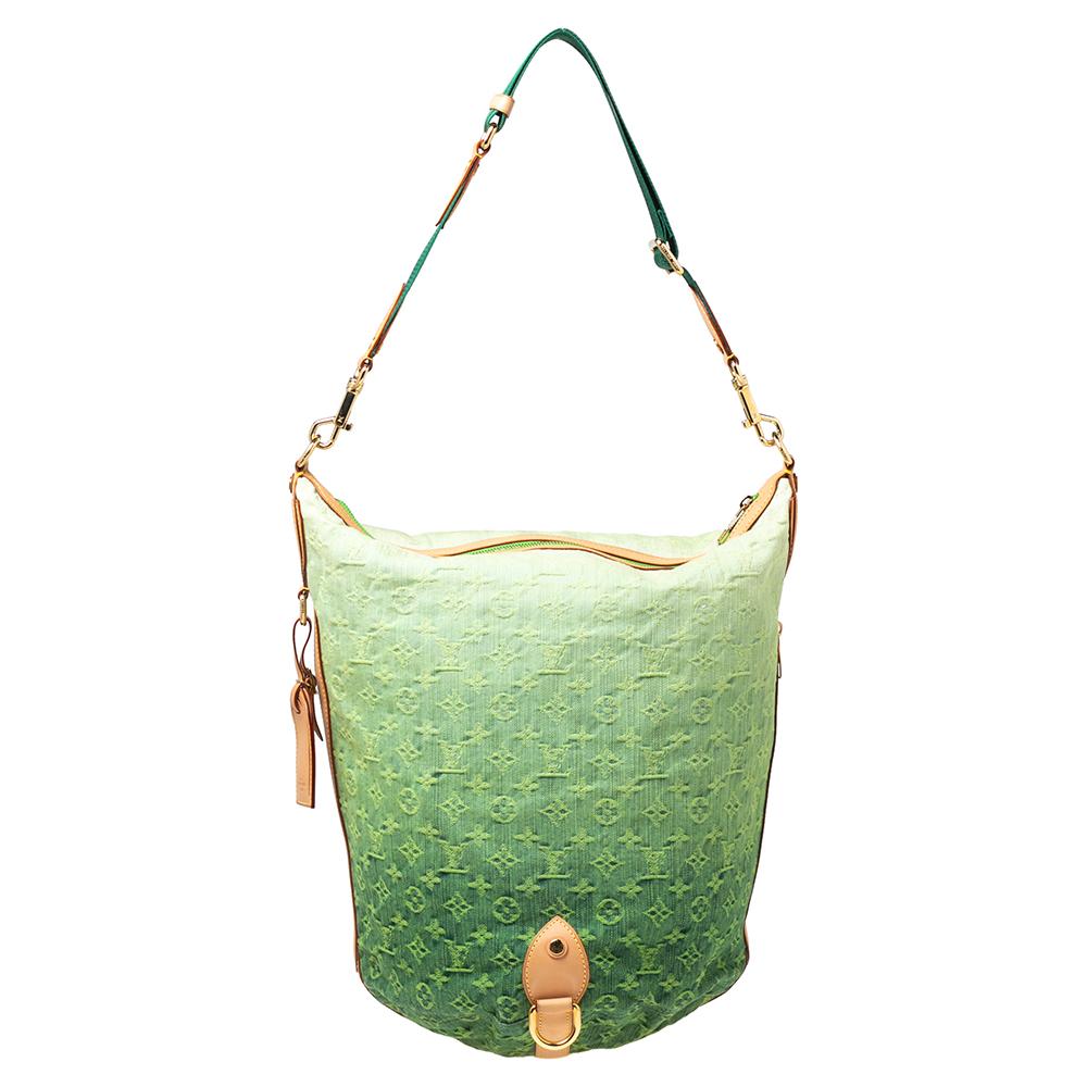 This Sunburst PM Limited Edition bag from the House of Louis Vuitton will bring timeless elegance and opulence to your collection. Designed using Vert Ombre Monogram denim, this bag flaunts leather trims and gold-toned hardware with a top handle. It