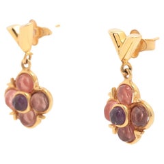 Boucles d'oreilles très fleuries Louis Vuitton rose violet