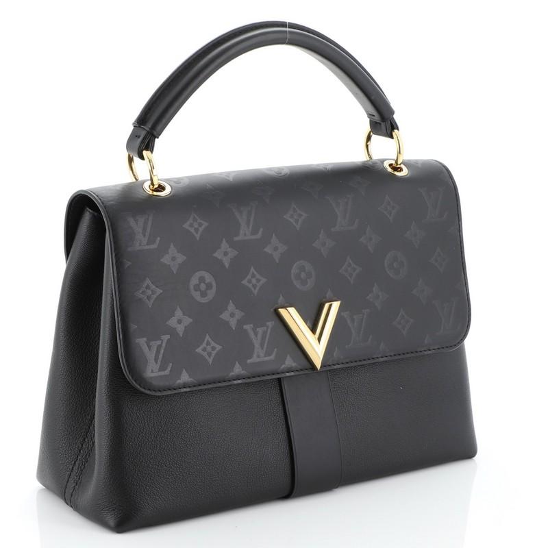 This Louis Vuitton Very One Handle Bag Monogram Leather, crafted in black monogram leather, features rolled leather handle, V logo at front flap and gold-tone hardware. Its flap opens to a black microfiber interior divided into two compartments with