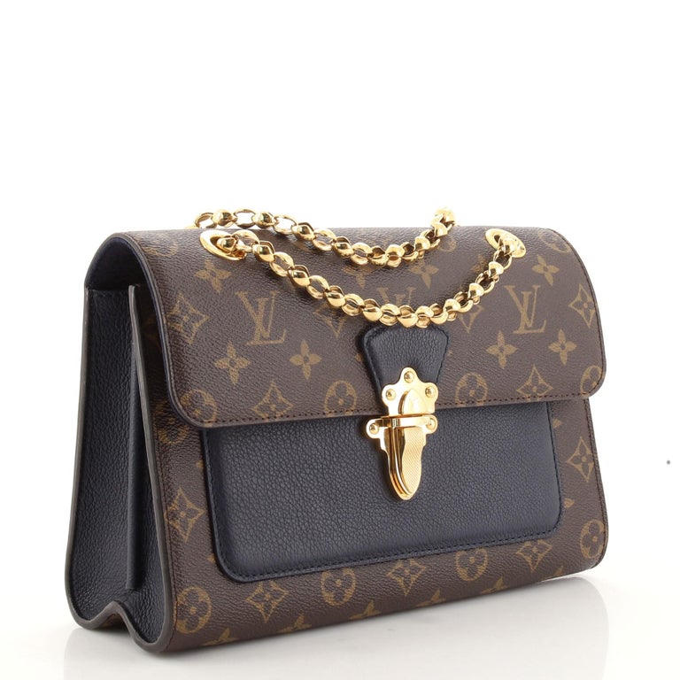 Louis Vuitton Monogram Canvas and Black Leather Victoire Bag For Sale at  1stDibs