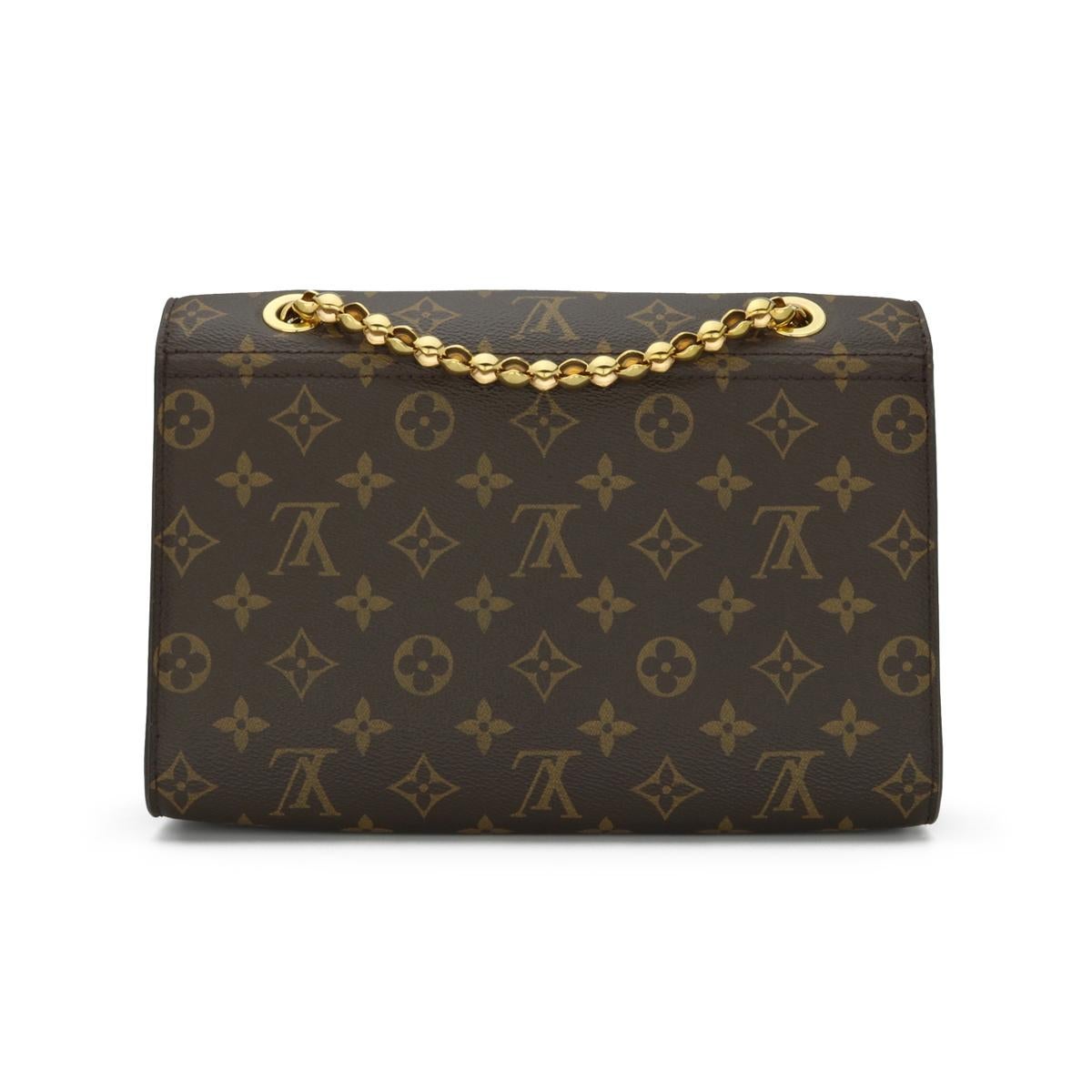 Brown Louis Vuitton Victoire Monogram Bag with Cherry Red Interior 2016 For Sale
