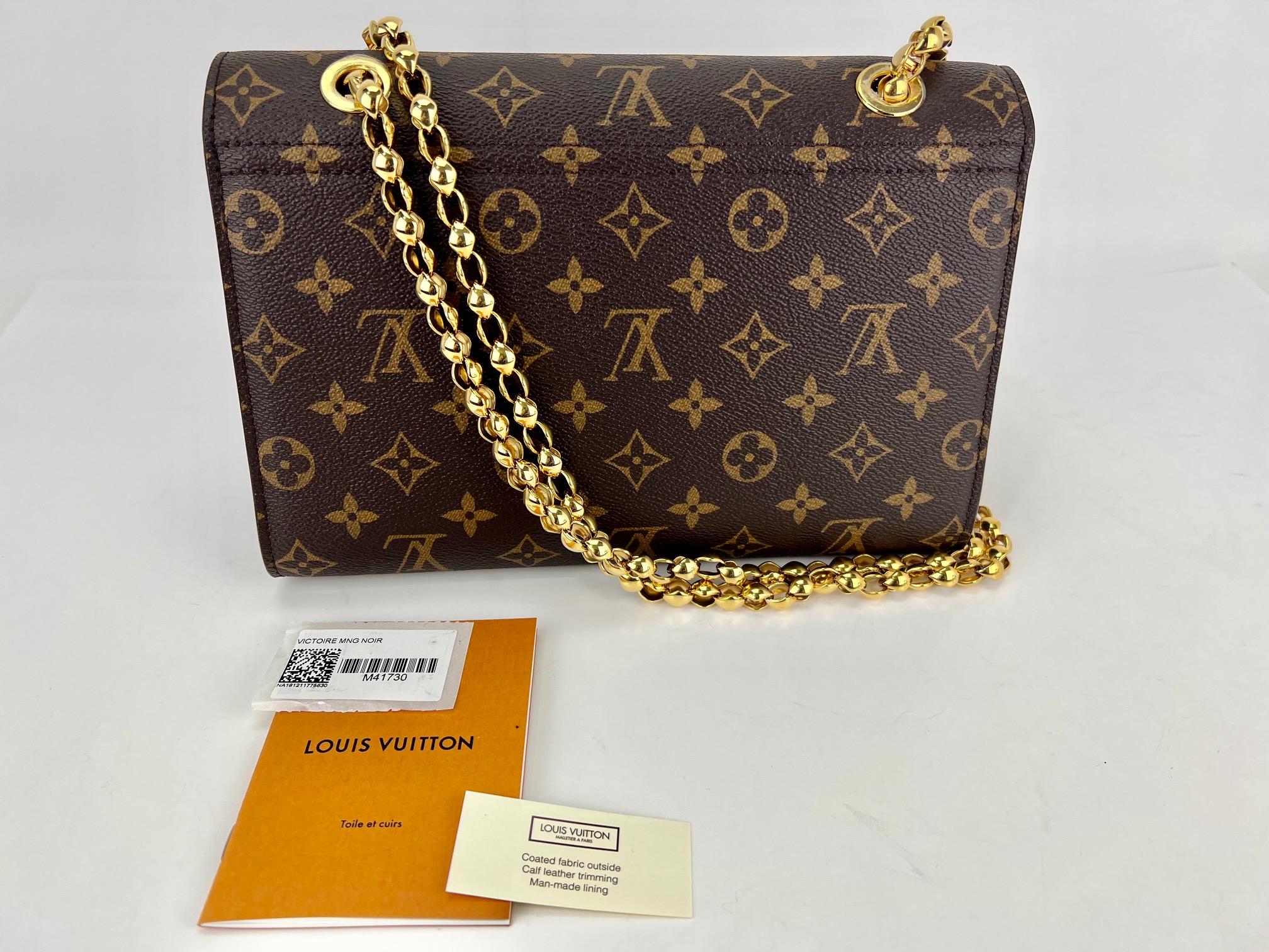 Pre-Owned  100% Authentic
LOUIS VUITTON Victoire Monogram Noir
RATING: A...excellent, near mint, only slight 
signs of wear
MATERIAL: monogram canvas, leather
STRAP: movable golden link chain
DROP: single 22.5''  doubled 12''
COLOR:  brown,