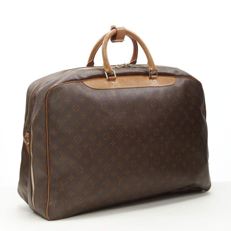 LOUIS VUITTON VIntage Alize brown monogram leather 2 compartment bag garment bag
Reference: AEMA/A00079
Brand: Louis Vuitton
Model: Alize
Material: Canvas, Leather
Color: Brown
Pattern: Solid
Closure: Zip
Lining:  Canvas
Extra Details: Alize 2