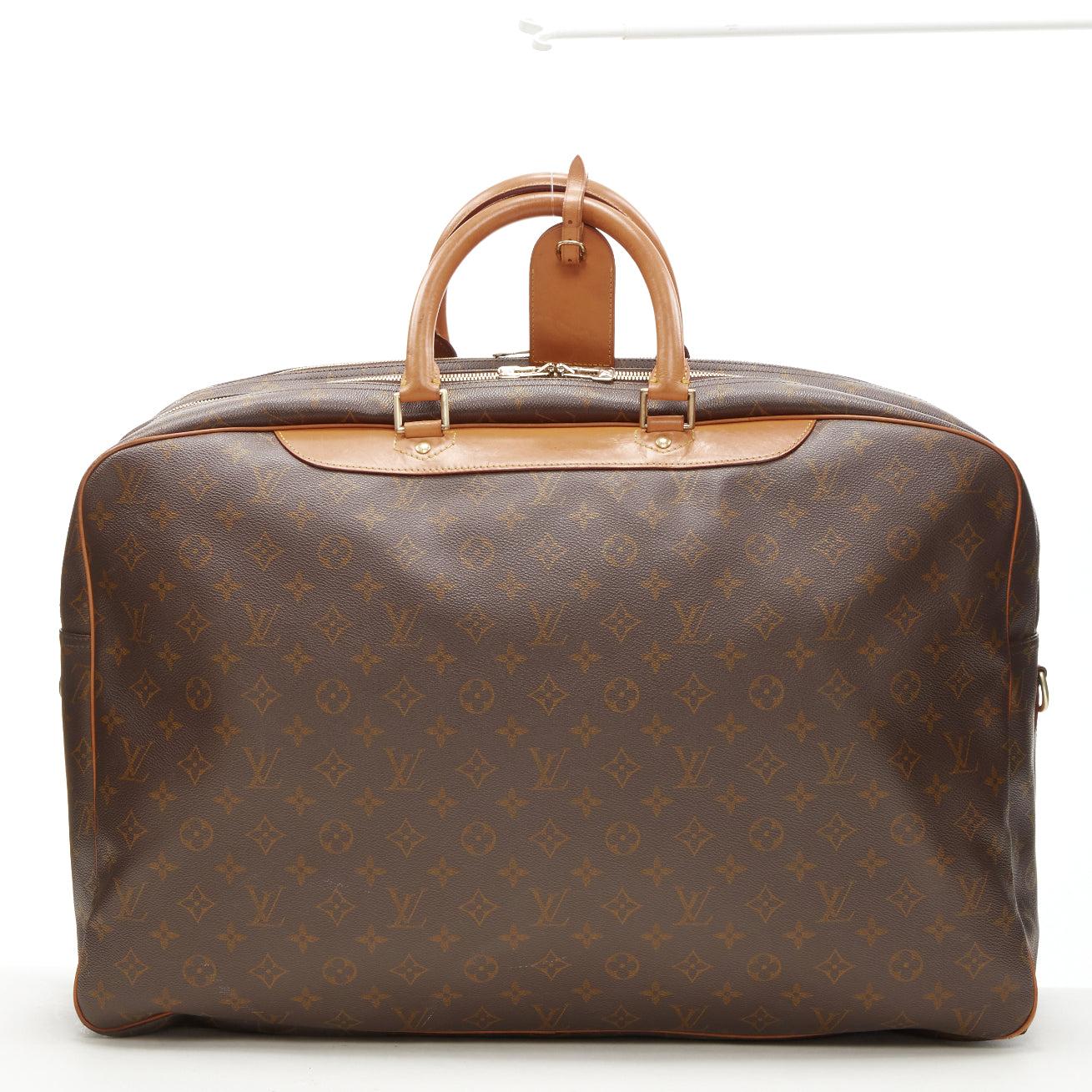 LOUIS VUITTON VIntage Alize brown monogram leather trim 2 compartment bag
Reference: AEMA/A00078
Brand: Louis Vuitton
Model: Alize
Material: Canvas, Leather
Color: Brown
Pattern: Solid
Closure: Zip
Lining: Canvas
Extra Details: Alize 2 compartent