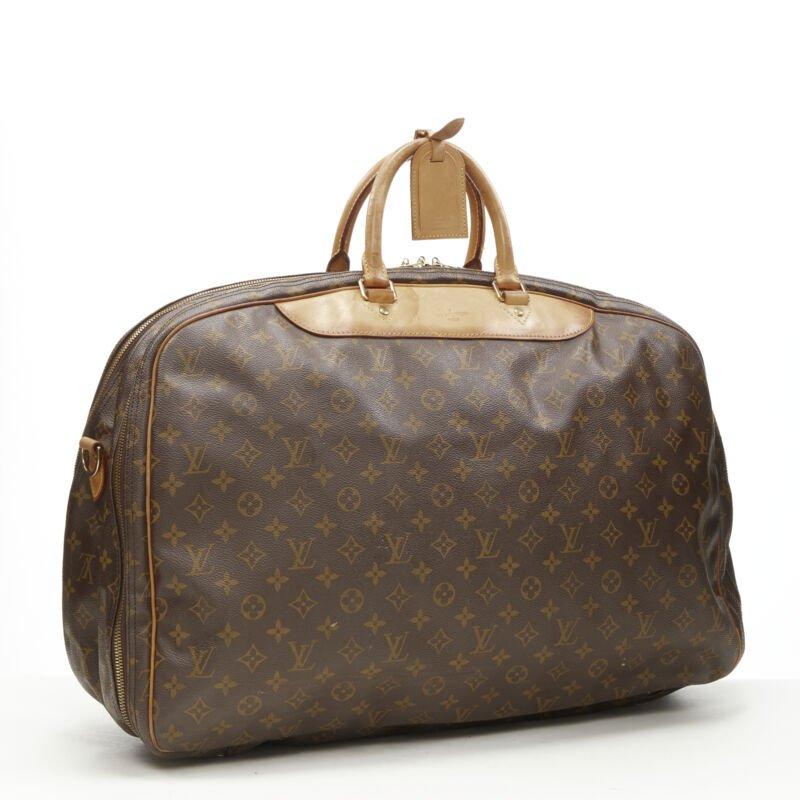 LOUIS VUITTON VIntage Alize brown monogram leather trim 2 compartment bag
Reference: AEMA/A00077
Brand: Louis Vuitton
Model: Alize
Material: Canvas, Leather
Color: Brown
Pattern: Solid
Closure: Zip
Lining:  Canvas
Extra Details: Alize 2 compartent