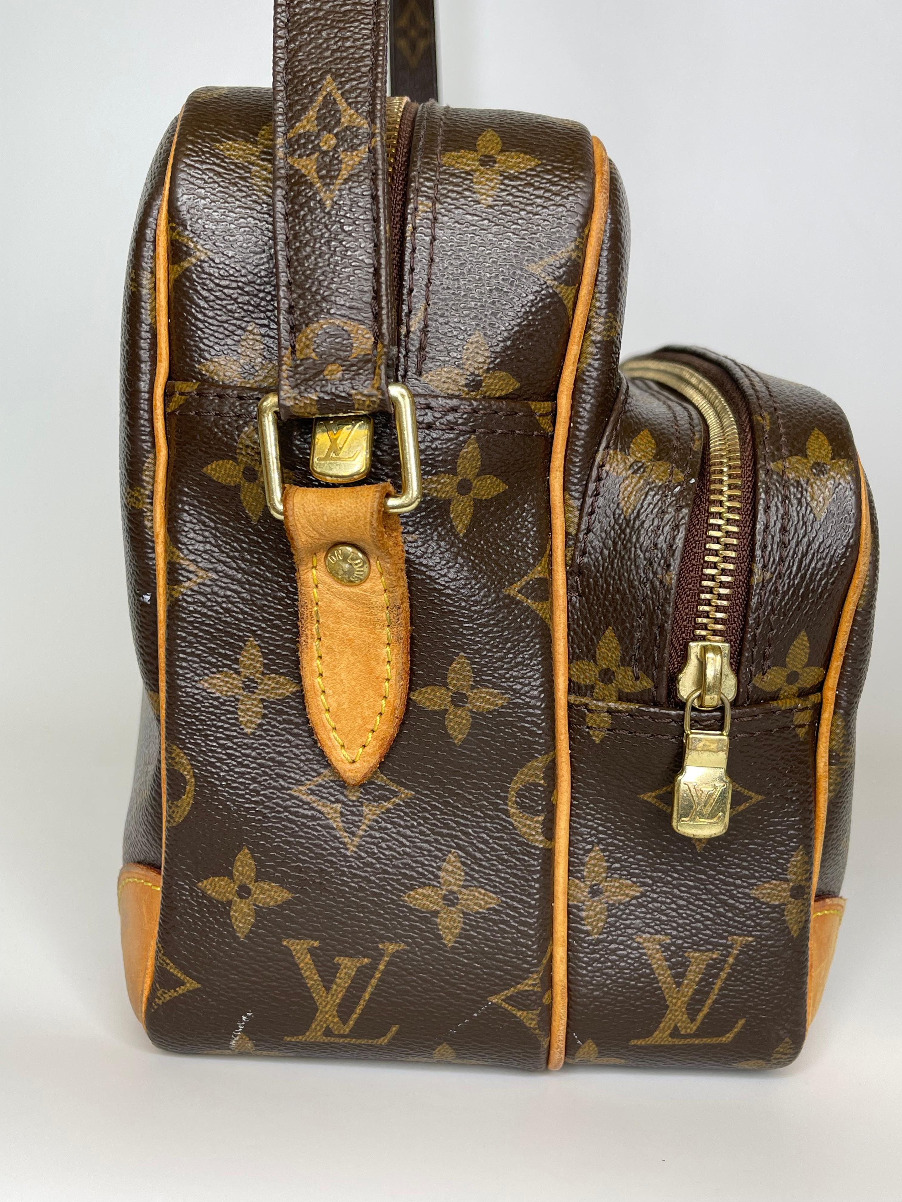 Black  Louis Vuitton Vintage Authentic Monogram Shoulder Bag Nile MM 2012