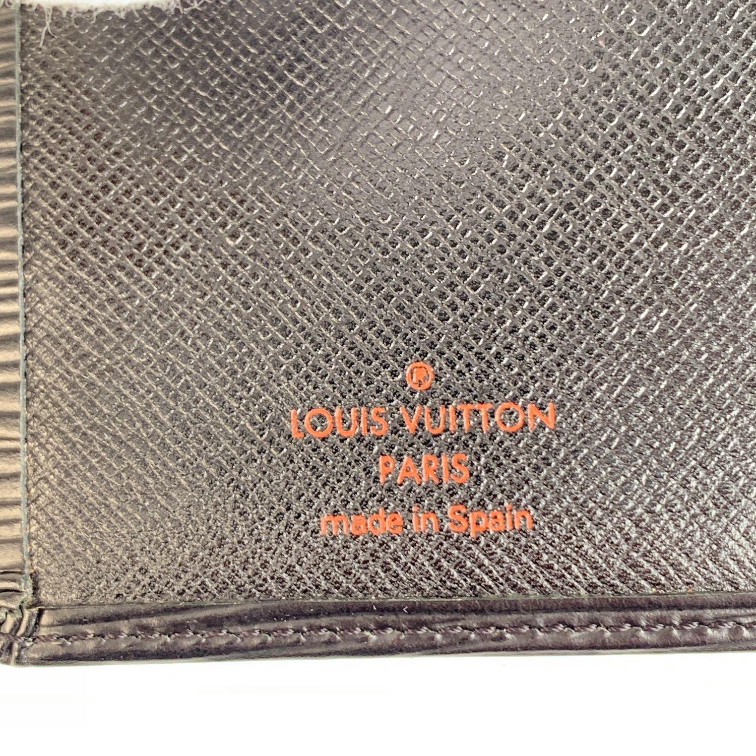 Louis Vuitton Vintage Black Epi Leather Vertical Bifold Wallet 1
