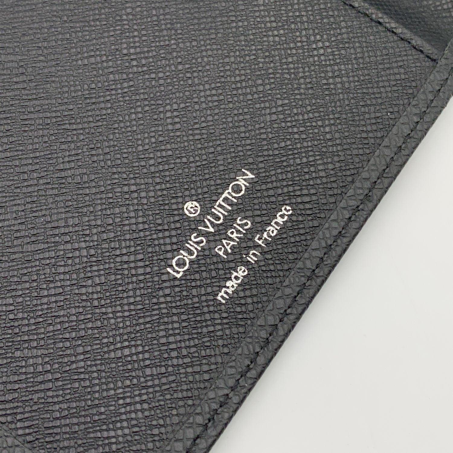 Louis Vuitton Vintage Black Taiga Leather Vertical Bifold Long Wallet For Sale 2