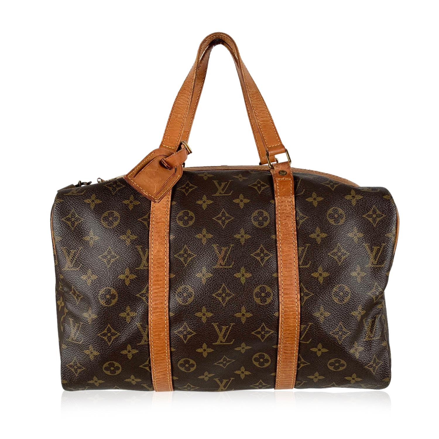 Louis Vuitton Vintage Brown Monogram Canvas Sac Souple 35 Bag

Material : Canvas
Color : Brown
Model : Sac Souple 35
Gender : Women
Country of Manufacture : France
Size : Medium
Bag Depth : 7 inches - 17.8 cm
Bag Height : 8.25 inches - 21 cm
Bag