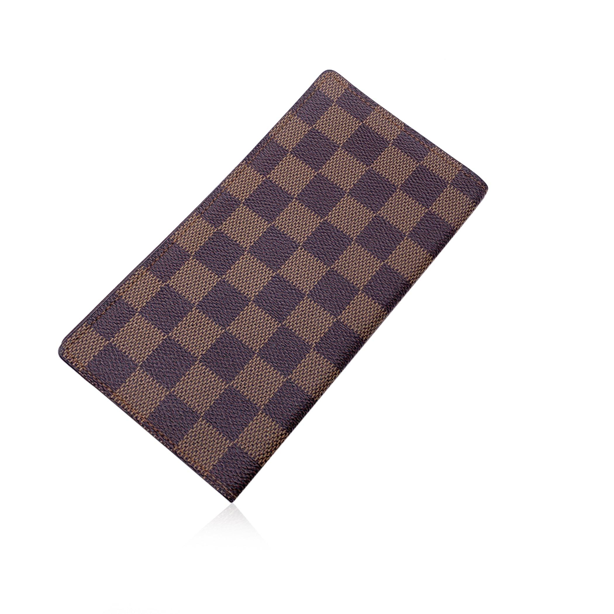 Vintage Louis Vuitton brown monogram canvas Long Bifold Bill Wallet. Dark brown leather lining. 3 open pockets, 6 credit card slots. 'LOUIS VUITTON Paris - made in France' engraved inside. Authenticity serial number inside Condition B - VERY GOOD