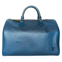 Louis Vuitton 2000s Blue Epi Speedy 30 · INTO