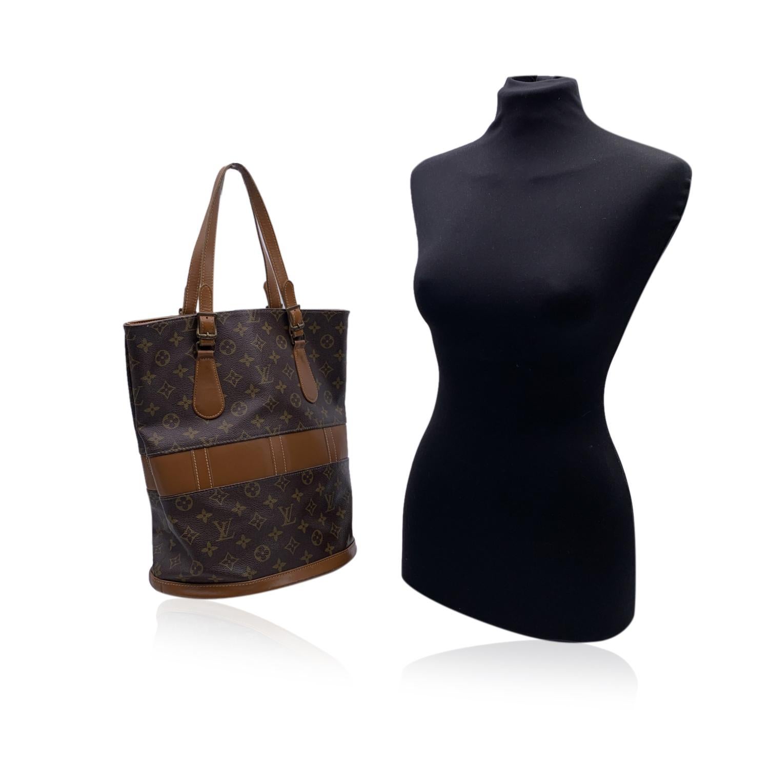 Louis vuitton french company bucket bag sales