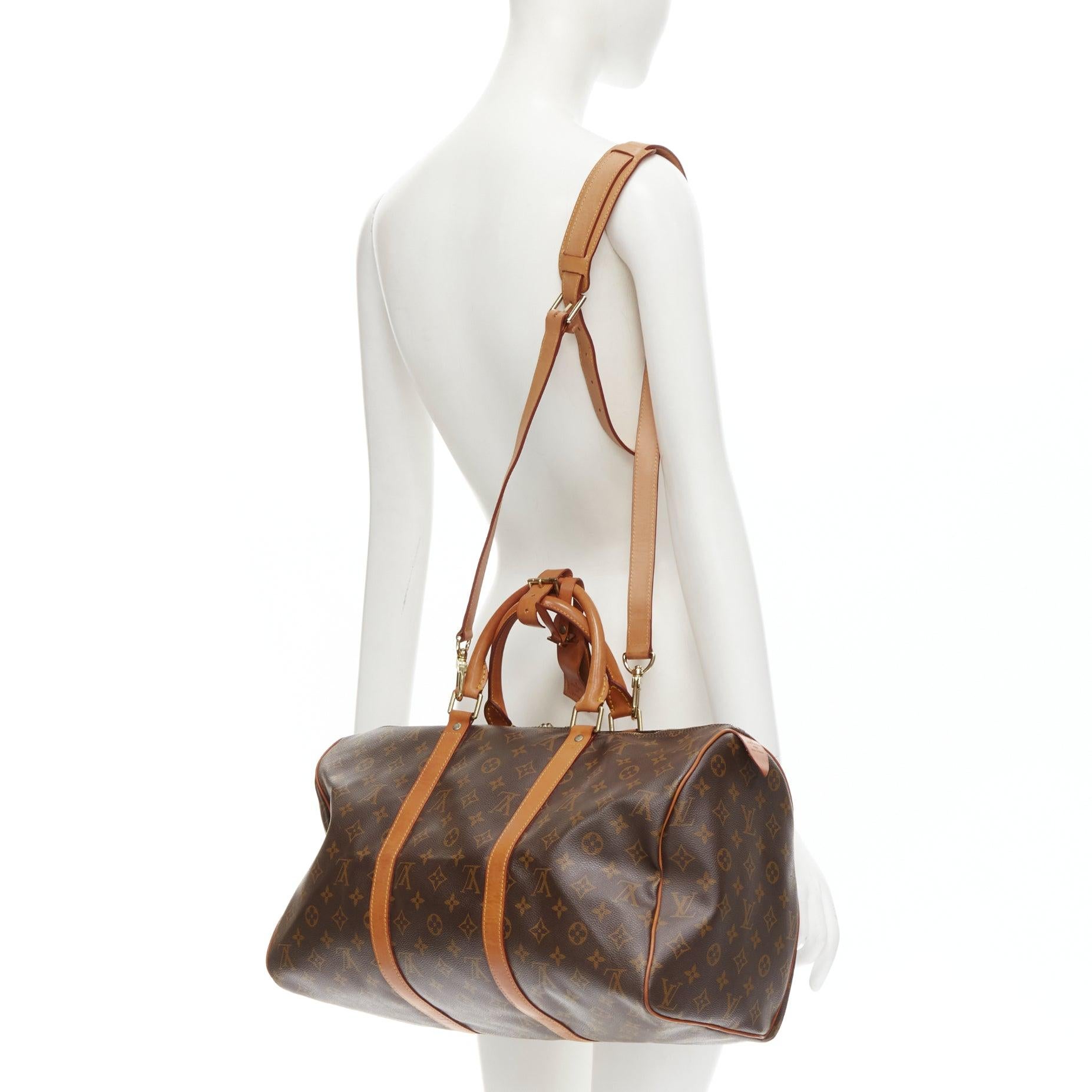 LOUIS VUITTON Vintage Keepall 45 brown monogram canvas leather trim carryall bag
Reference: AEMA/A00076
Brand: Louis Vuitton
Model: Speedy 45
Material: Canvas, Leather
Color: Brown
Pattern: Solid
Closure: Zip
Lining: Fabric
Extra Details: Speedy