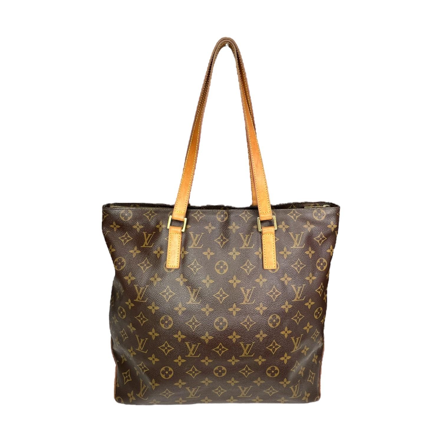 This Louis Vuitton Monogram Cabas Piano Tote was made in the USA in 2002 and it is finely crafted of the classic Louis Vuitton Monogram canvas exterior with leather trimming and gold-tone hardware features. It has dual flat leather shoulder straps.