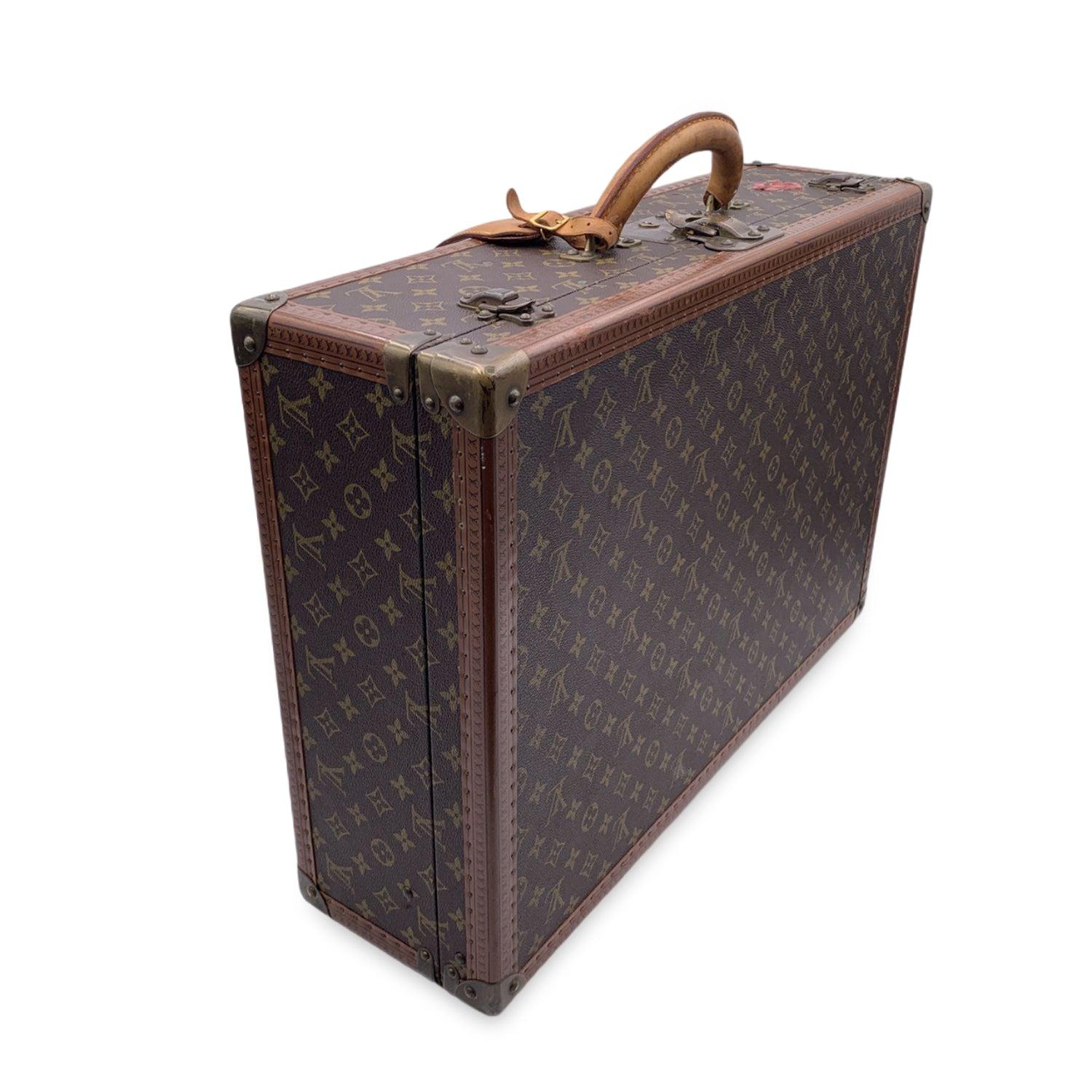 LOUIS VUITTON vintage Monogram Bisten 60 Suitcase, mod. M21326. A part of Louis Vuitton history, ideal for travel or for home or office decor. Monogram canvas. LV monograms embossed on trim. Rounded leather handle. Leather ID tag included. Canvas