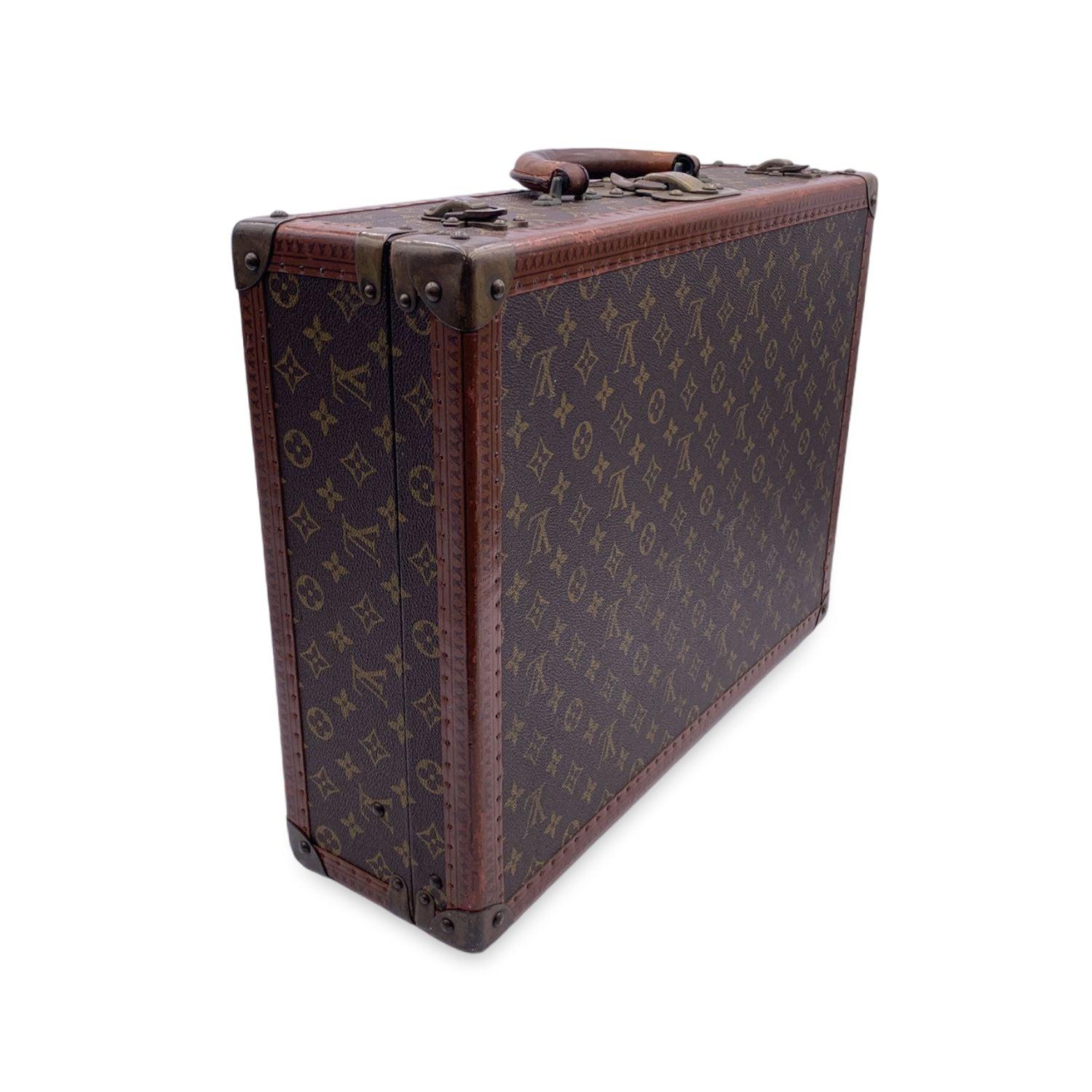 LOUIS VUITTON vintage Monogram Cotteville 50 Suitcase, mod. M21422. A part of Louis Vuitton history, ideal for travel or for home or office decor. Monogram canvas. LV monograms embossed on trim. Rounded leather handle. Canvas interior. Louis Vuitton