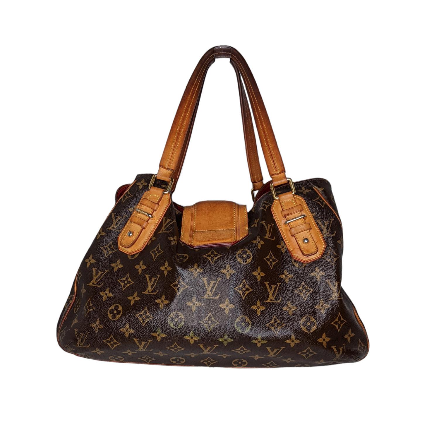 Don't miss out on your opportunity to own this hard-to-find Louis Vuitton Monogram Canvas Griet Bag. It features an ultra-spacious interior with three separate compartments including a secured middle zip compartment. This sleek tote will be your new