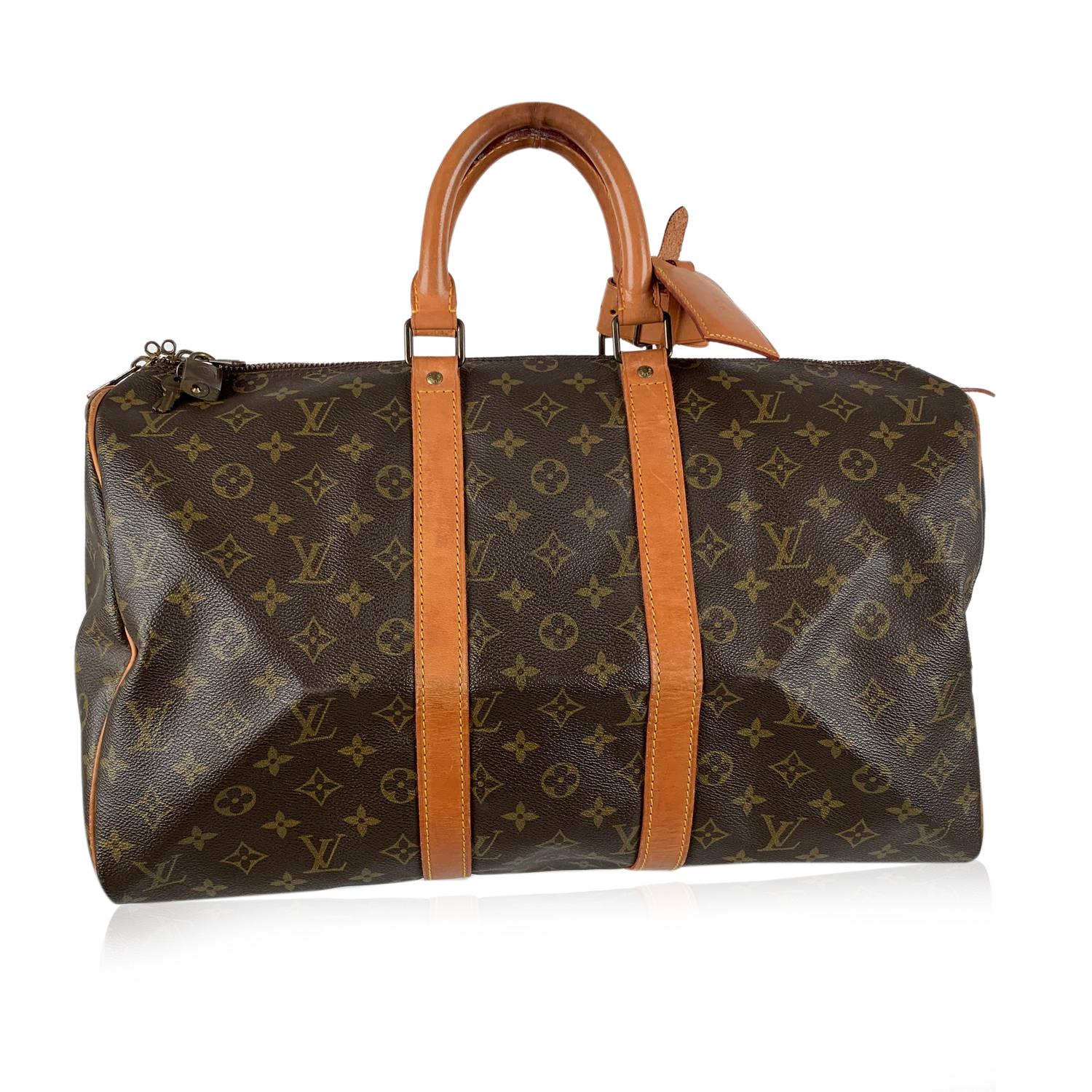 Louis Vuitton Vintage Monogram Canvas Keepall 45 Travel Bag

Material : Canvas
Color : Brown
Model : Keepall 45
Gender : Women, Men
Country of Manufacture : France
Size : Large
Bag Depth : 8 inches - 20 cm 
Bag Height : 11 inches - 29 cm
Bag Length