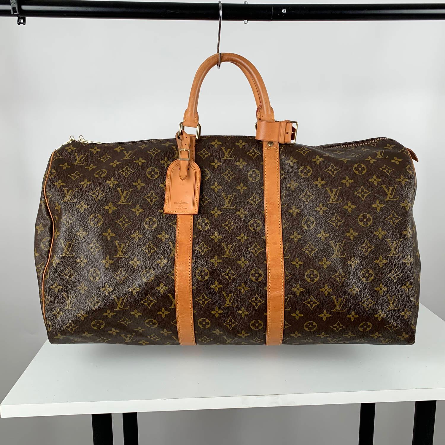 Louis Vuitton Vintage Monogram Canvas Keepall 55 Travel Bag

Material : Canvas
Color : Brown
Model : Keepall 55
Gender : Women, Men
Country of Manufacture : France
Size : Large
Bag Depth : 10 inches - 25.5 cm
Bag Height : 11.5 inches - 29,2 cm 
Bag