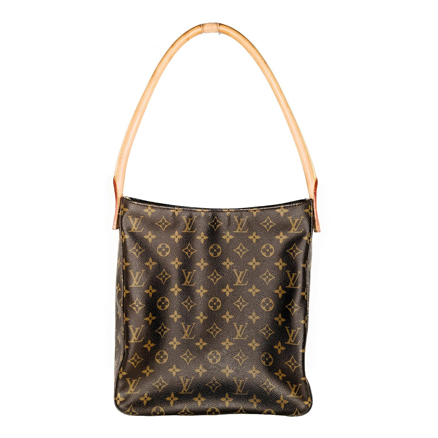 Brown and tan monogram coated canvas Louis Vuitton Looping GM with brass hardware, tan vachetta leather trim, single rolled shoulder strap, beige Alcantara lining, dual interior pockets; one with zip closure and zip closure at top. Retail