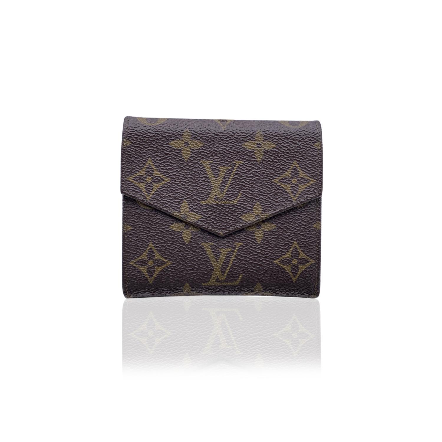 Louis Vuitton Vintage square-shaped wallet with double side flap. Crafted in brown monogram canvas. Tan leather lining. 1 flap coin compartment on a side and a trifold section on the other side, with 2 bill compartments. 'Louis Vuitton Paris - Made