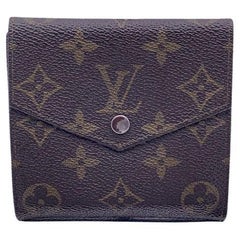 Louis Vuitton Portefeuille de poche à double rabat vintage en toile monogrammée