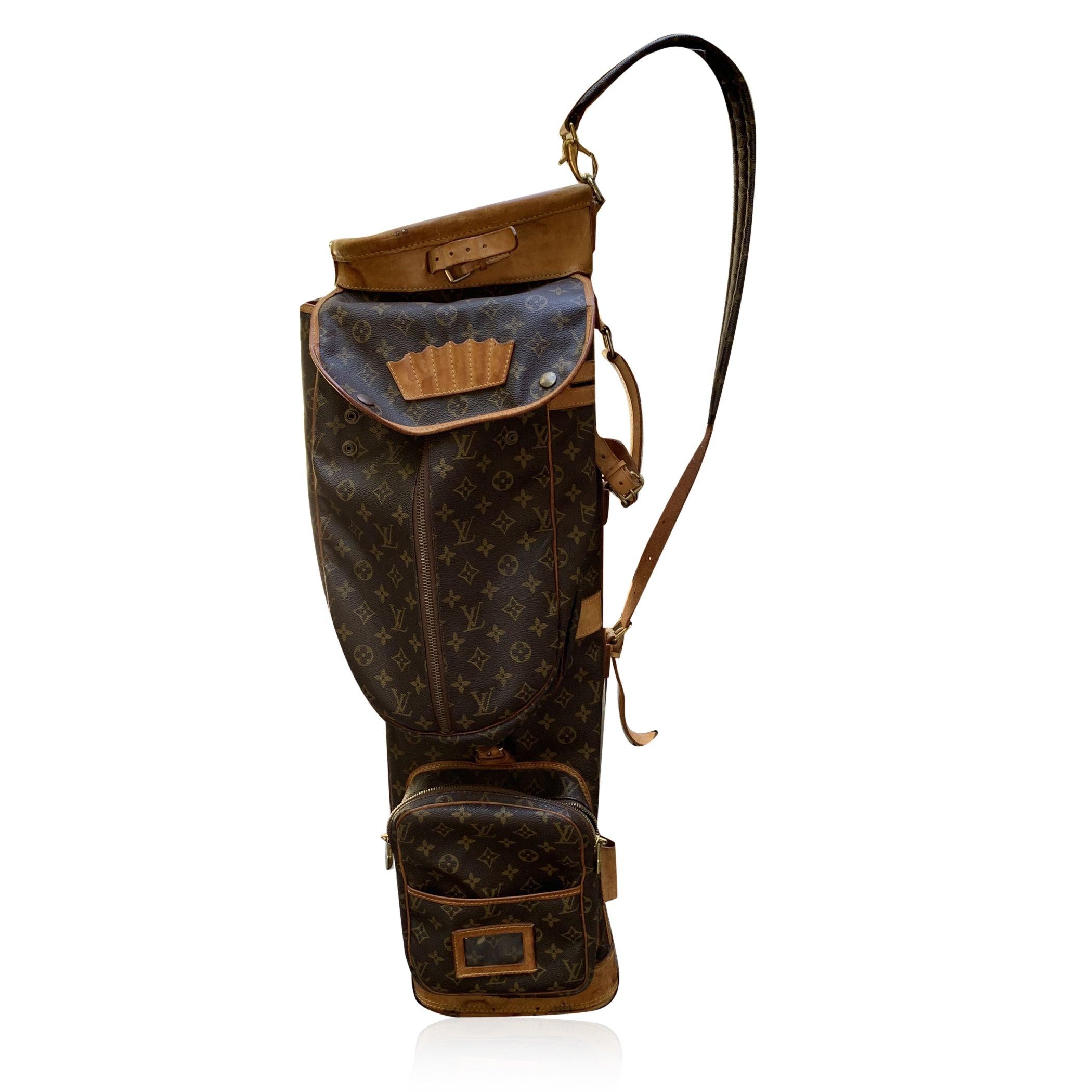 This vintage Louis Vuitton golf bag is a perfect blend of style and practicality, ideal for any discerning golfer who appreciates both form and function. Crafted from the iconic monogram canvas, this bag is finished with rich genuine leather accents