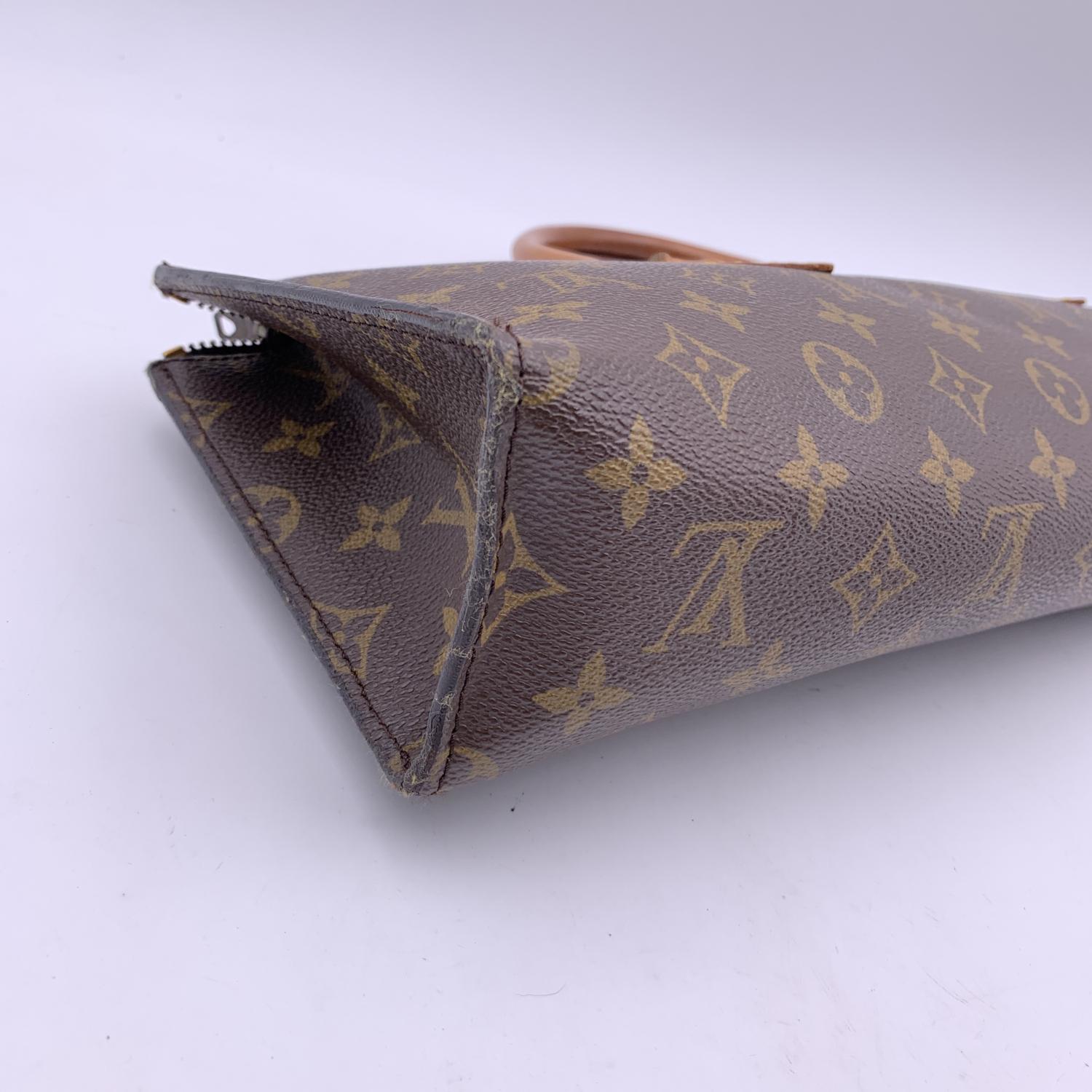 Louis Vuitton Vintage Monogram Canvas Sac Triangle Tricot Bag In Excellent Condition In Rome, Rome