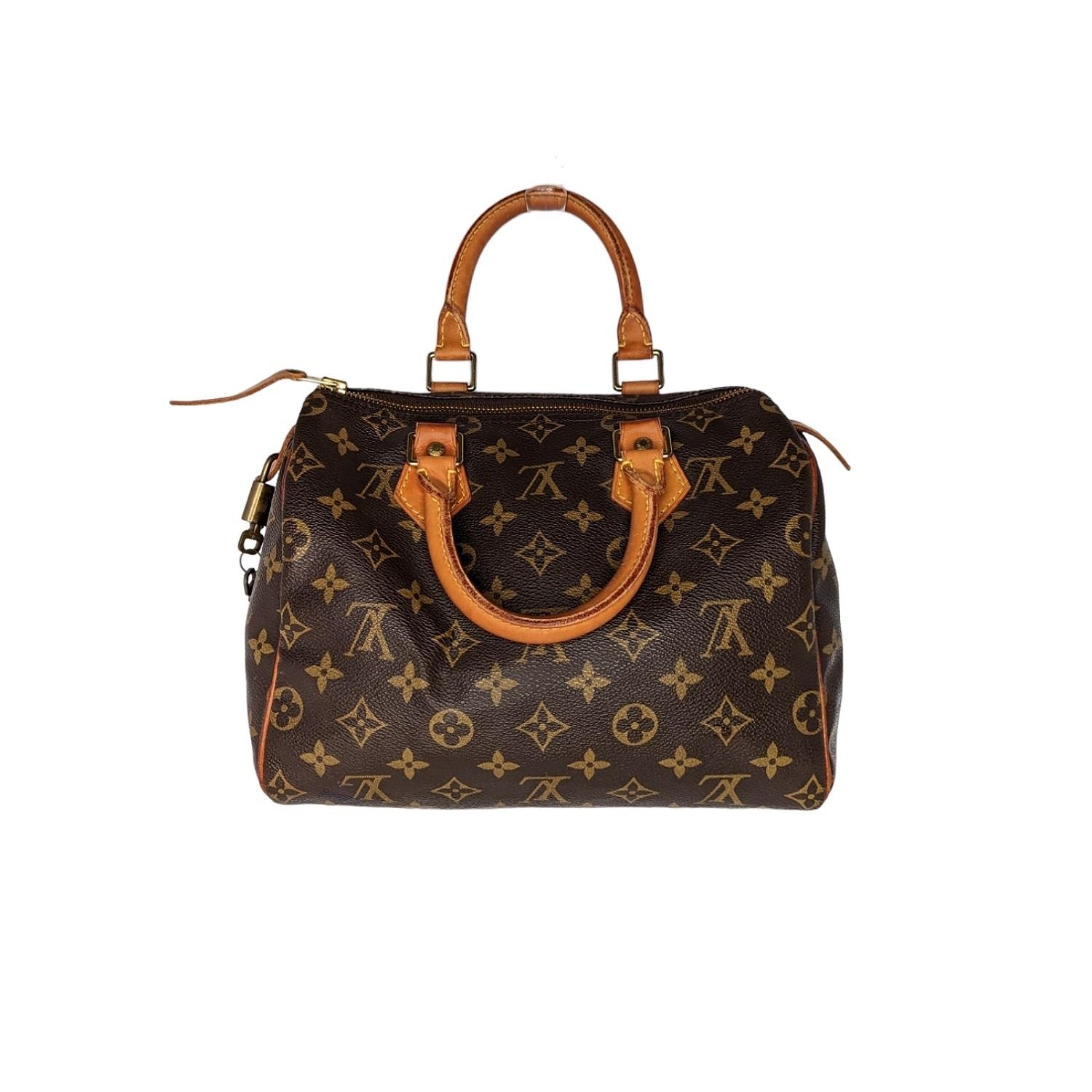 This stylish vintage speedy 25 is crafted of monogram canvas, dual rounded handles and trimmings in natural cowhide leather. Featuring a golden color metallic hardware, single zip closure opens to a spacious interior with one patch pocket. Est.