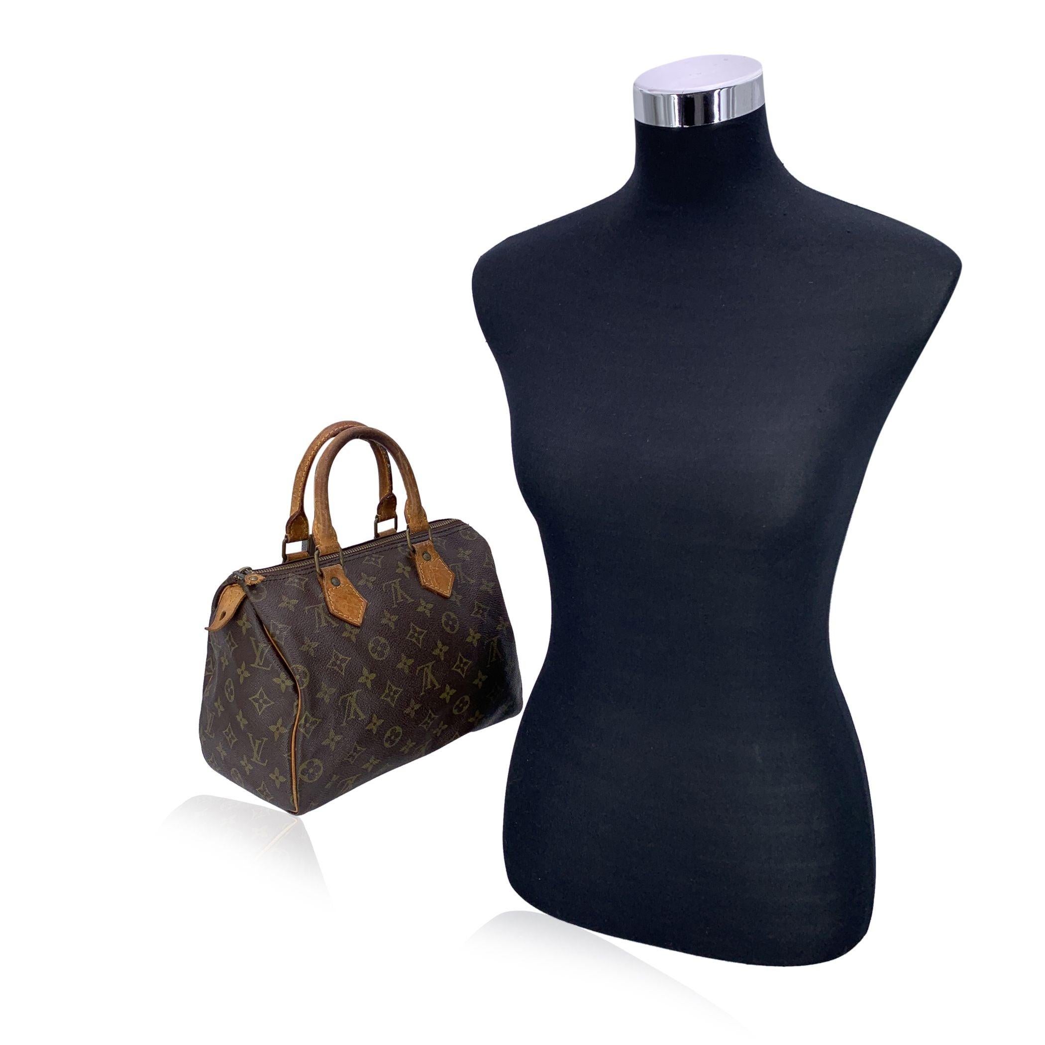 The Louis Vuitton Speedy 25 is an iconic piece from one of the most beloved lines in the Louis Vuitton collection. Known for its timeless appeal and versatility, this classic bag is crafted from the brand's signature brown monogram canvas, exuding