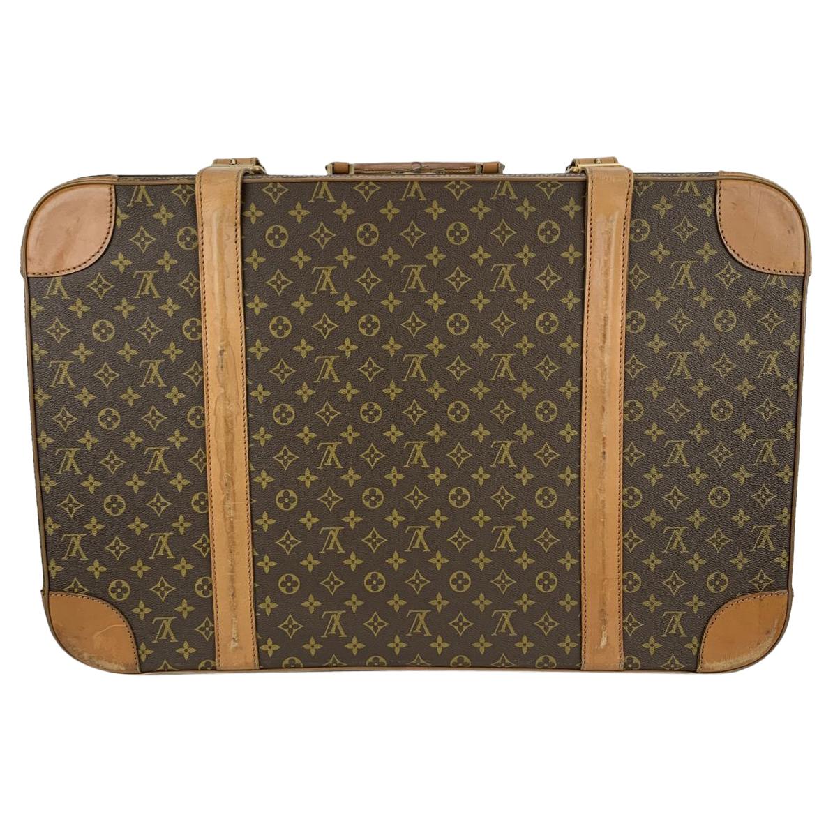 Two Louis Vuitton Stratos 60 Luggage Cases Auction
