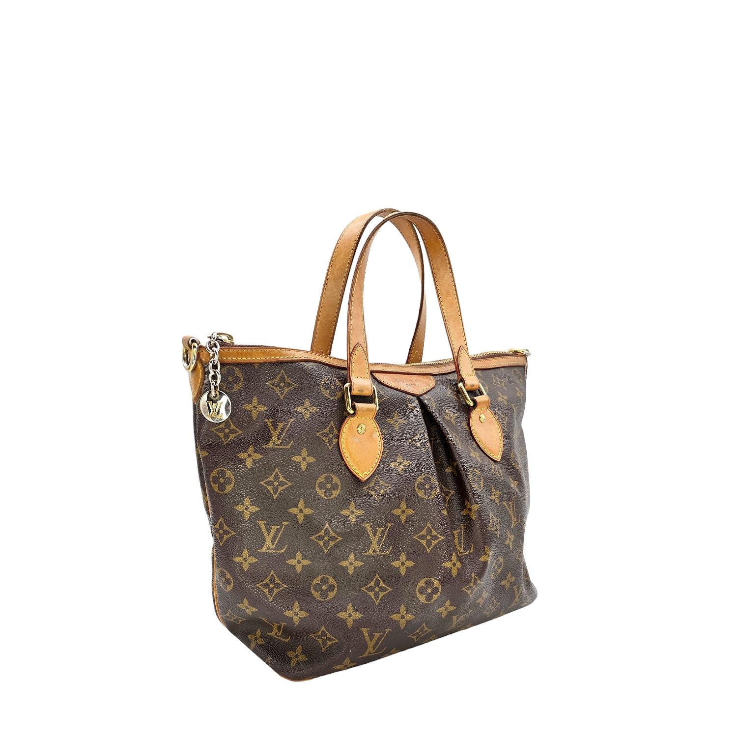 Indulge in luxury with this Louis Vuitton Vintage Monogram Canvas Tivoli PM Satchel. Crafted from the iconic monogram canvas with natural vachetta leather trim and gold-tone hardware, this tote exudes sophistication. The spacious interior and 2
