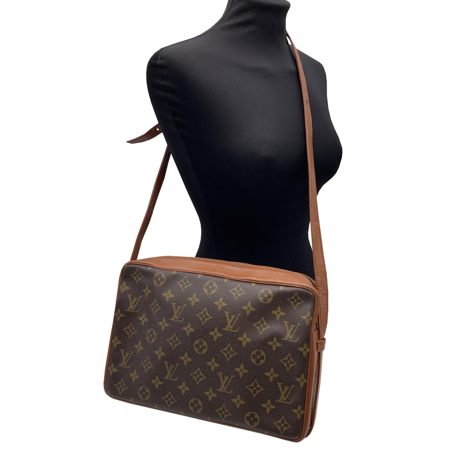 Louis Vuitton Vintage Monogram Canvas 'Tuileries' Messenger Bag. Monogram Canvas and genuine leather. Adjustable leather shoulder strap. Upper zipper closure. Interior fully lined in leather. 1 side zip pocket and 2 side open pockets inside. Data