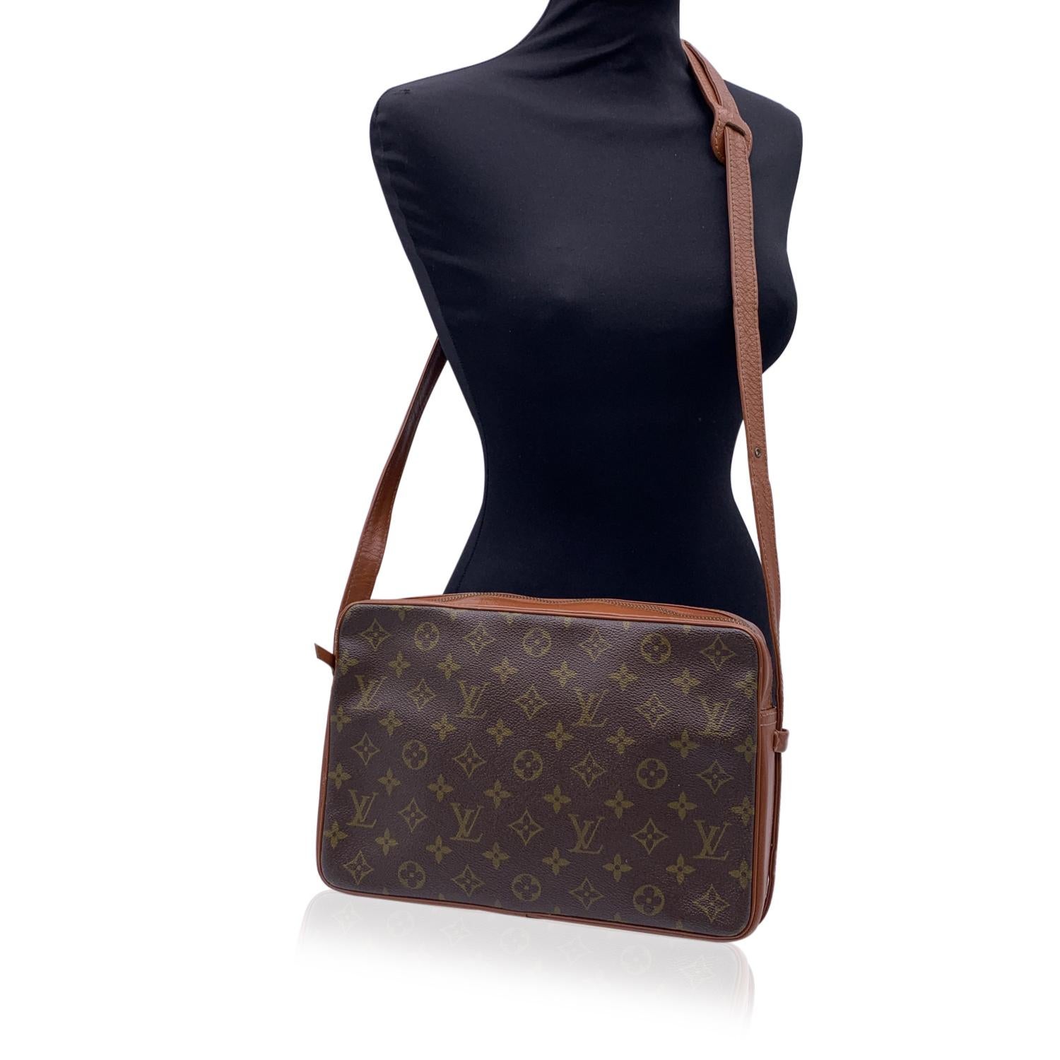 Louis Vuitton Vintage Monogram Canvas 'Tuileries' Messenger Bag. Monogram Canvas and genuine leather. Adjustable leather shoulder strap. Upper zipper closure. Interior fully lined in leather. 1 side zip pocket and 2 side open pockets inside. 'Louis