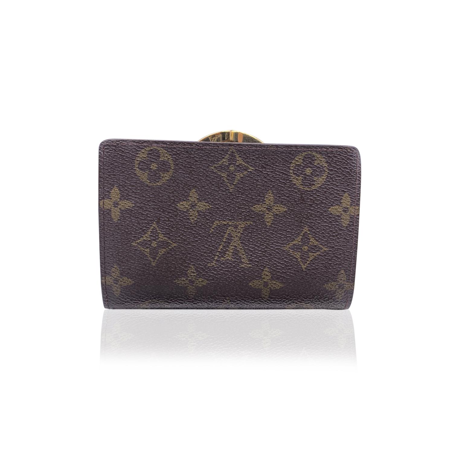 Louis Vuitton vintage brown monogram canvas Viennois wallet. It features 4 credit card slots, 2 open pocket, 1 coin compartment, 1 bill compartment. 'Louis Vuitton Paris - made in france' embossed inside. Authenticity serial number engraved inside