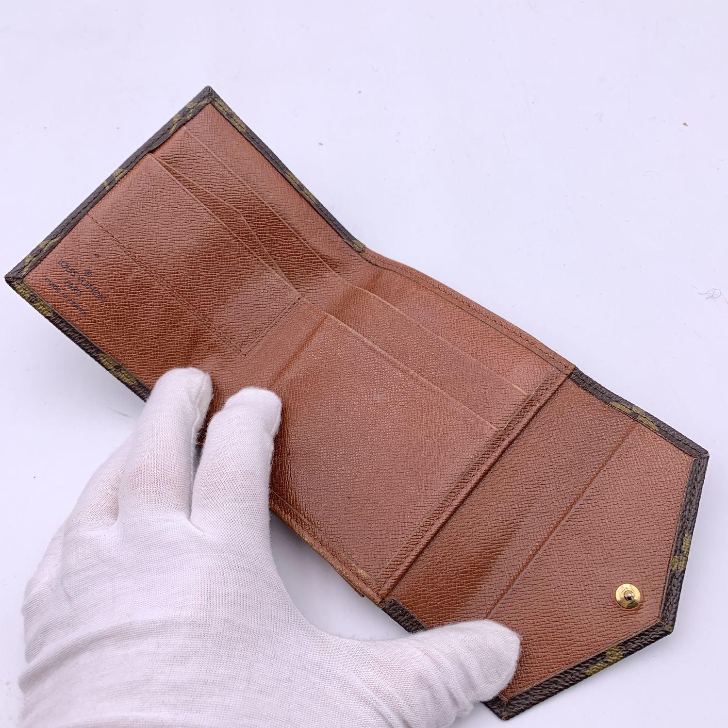 Women's Louis Vuitton Vintage Monogram Compact Double Flap Wallet M61652