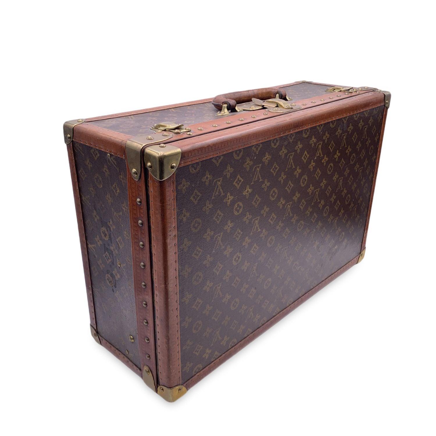 Rare LOUIS VUITTON vintage Monogram 'Alzer 60' Suitcase bag. A part of Louis Vuitton history, ideal for travel or for home or office decor. Hard-sided case, mid-20th-century, originally purchased from D.Altman in New York. The exterior is finished