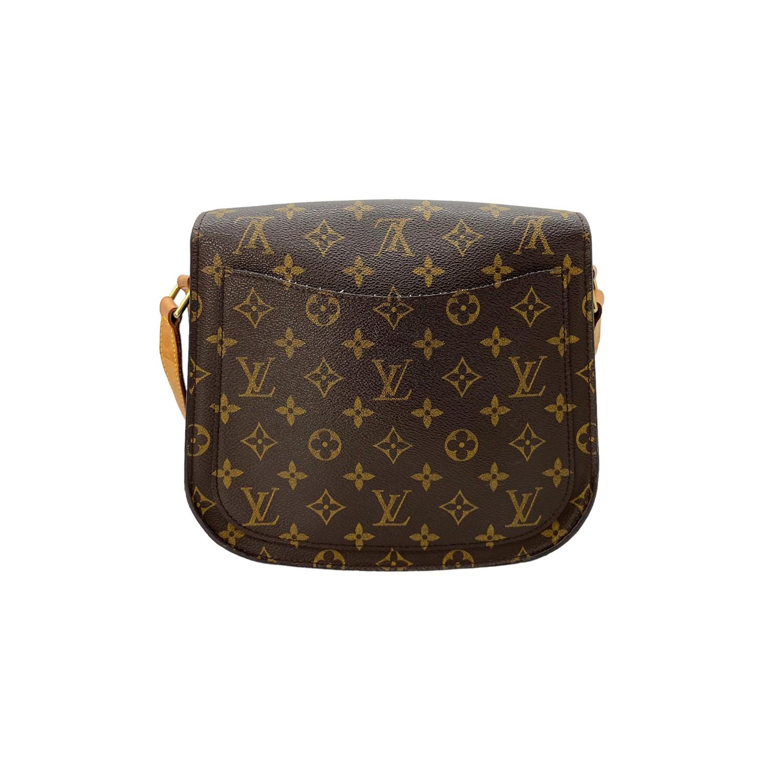 This Louis Vuitton Monogram Saint Cloud GM was made in France in 2002 and it is finely crafted of the iconic Louis Vuitton Monogram coated canvas with leather trimming and gold-tone hardware features. It has a flat leather adjustable shoulder strap.