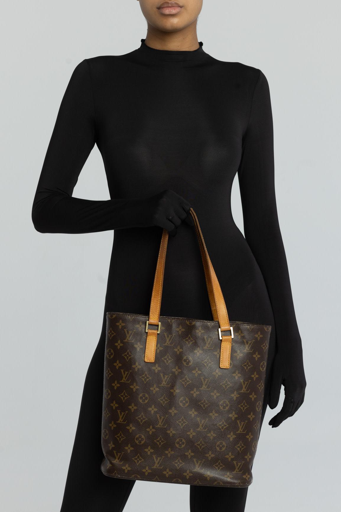 Color: Brown monogram print
Material: Coated canvas with vachetta leather details
Date code: SR1001
Year: 2001
Made in France

Measurements~
Height 12
