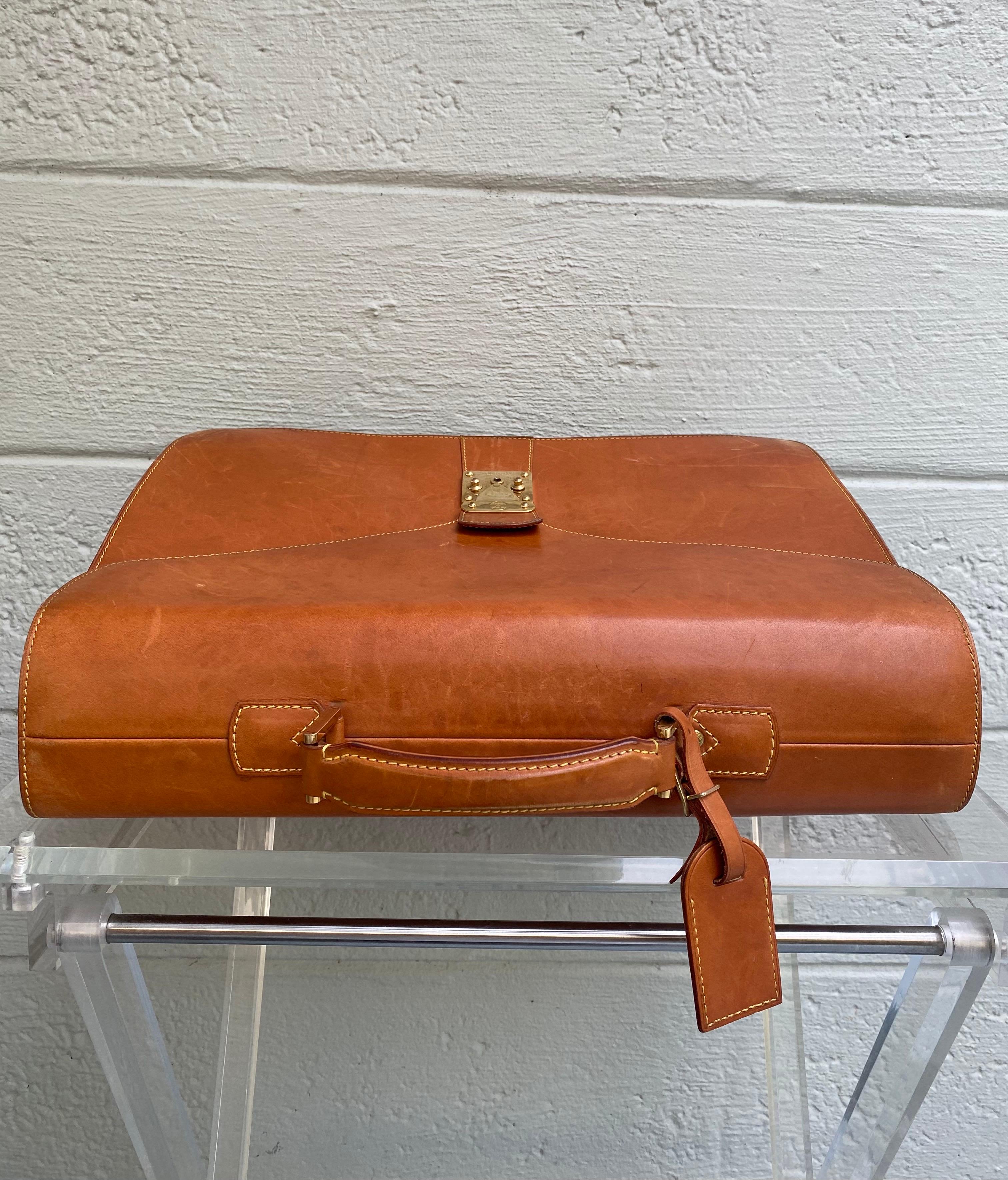 Women's or Men's Louis Vuitton Vintage Nomade Leather Briefcase