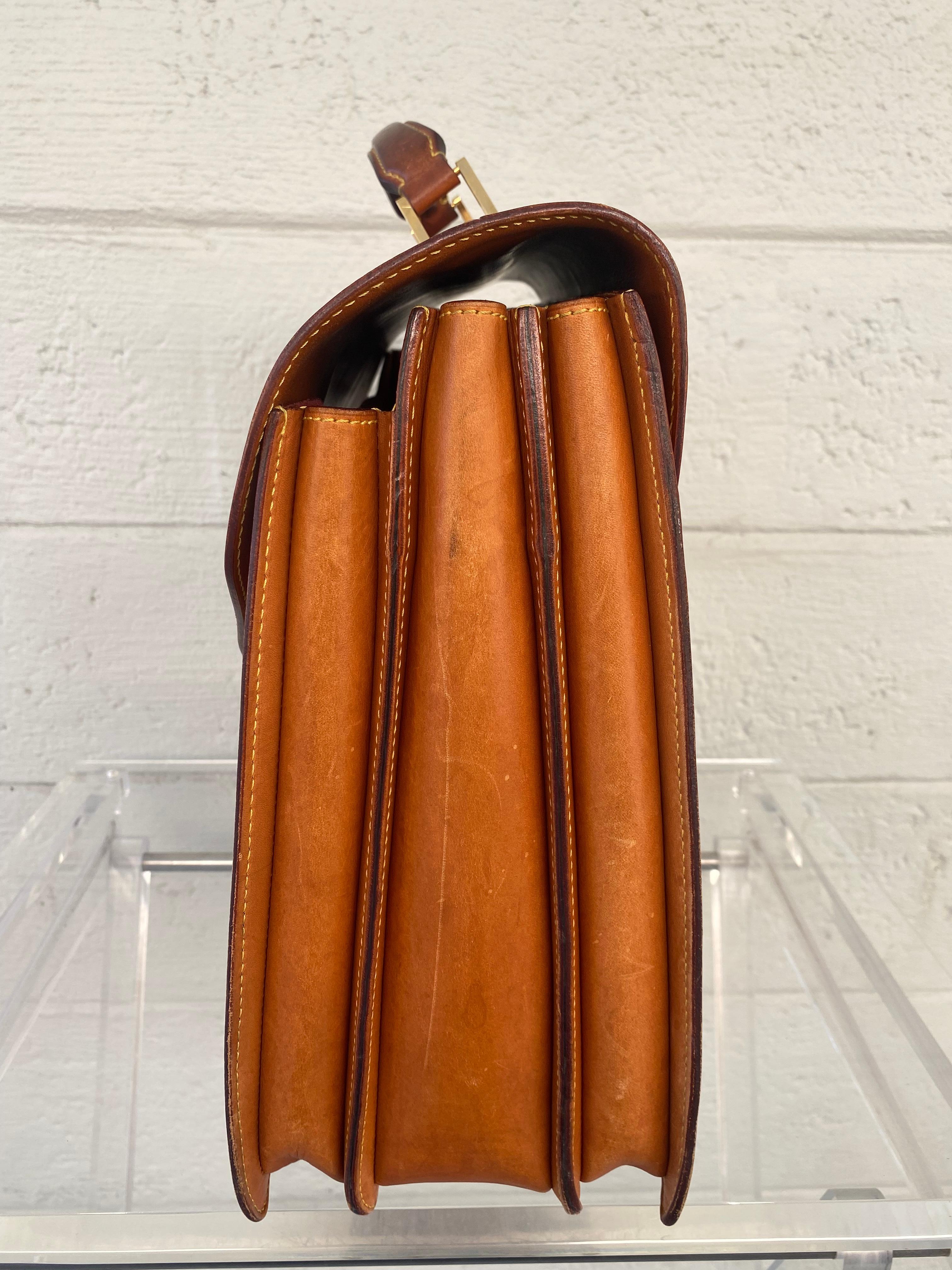 Nomade Leder-Aktentasche von Louis Vuitton mit drei Fächern 2