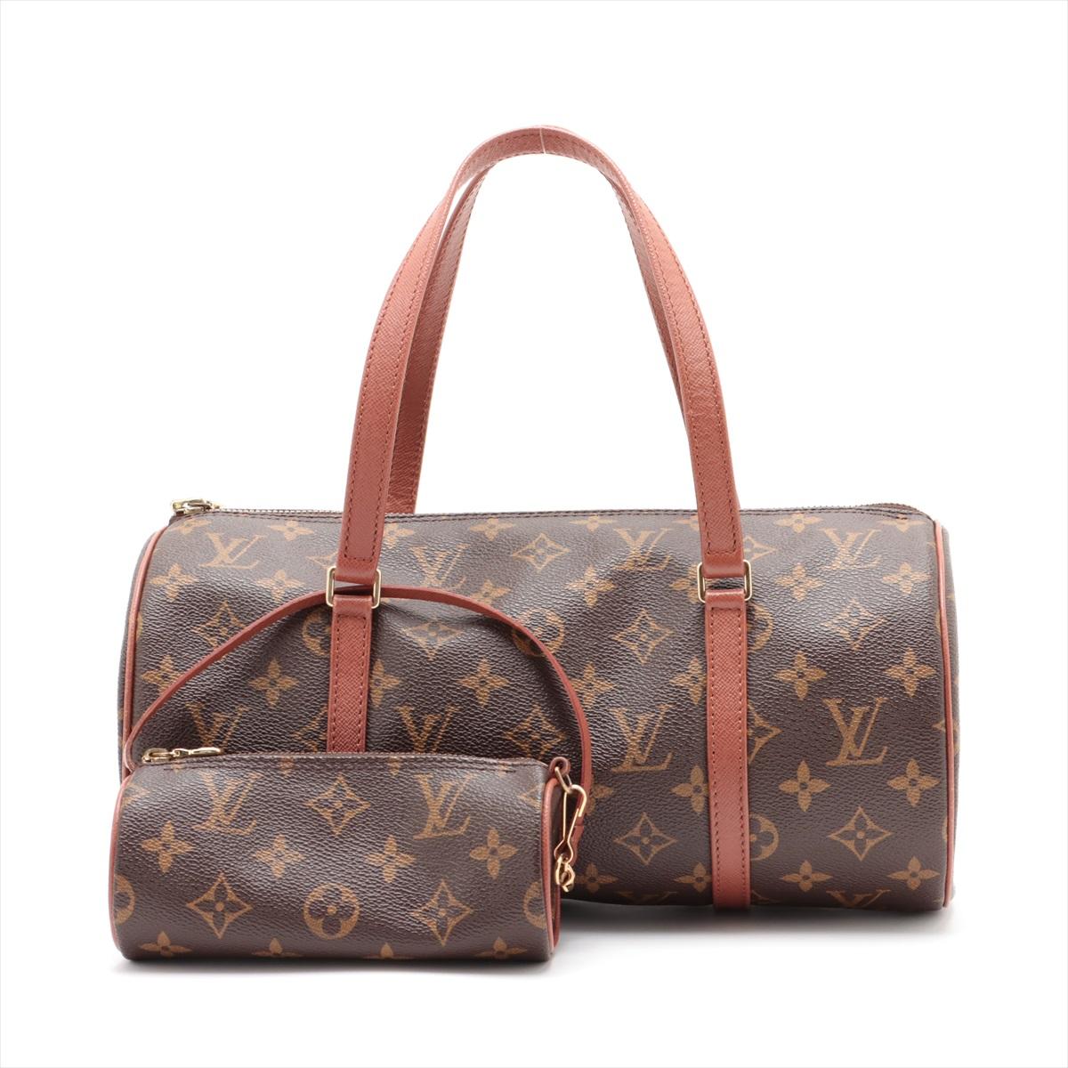 *will ship about 12/9
The Louis Vuitton Monogram Papillon 30 is a quintessential handbag that perfectly blends style and functionality. Crafted from the iconic Monogram canvas, the bag features a unique cylindrical shape that sets it apart. With its