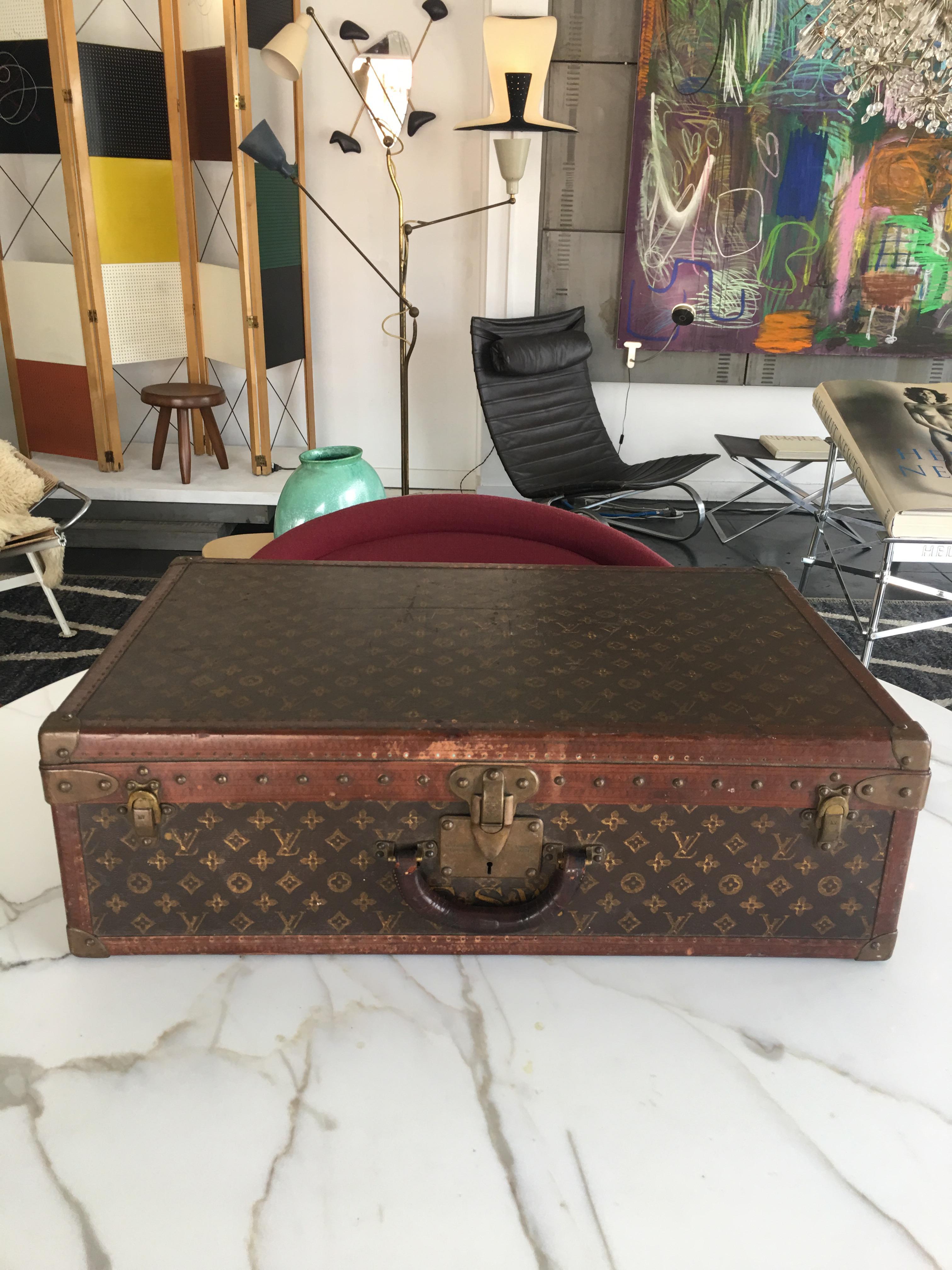 Vintage suitcase by Louis Vuitton, in great vintage condition. France 1940s.