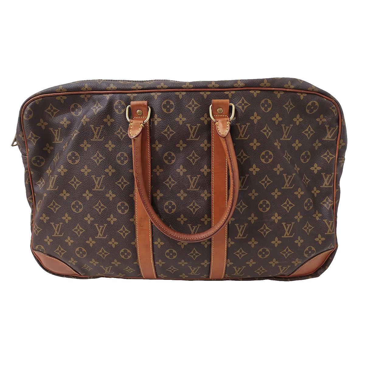 Iconic LV travel bag
Vintage 
Monogram 
Double handle
Three compartments
Zip closure
Address-pendant
Cm 68 x 38  (26,77 x 14,96 inches)
Few signs on the leather buckles, see pictures
Some missing zip sliders, see pictures
Presence of some spots due