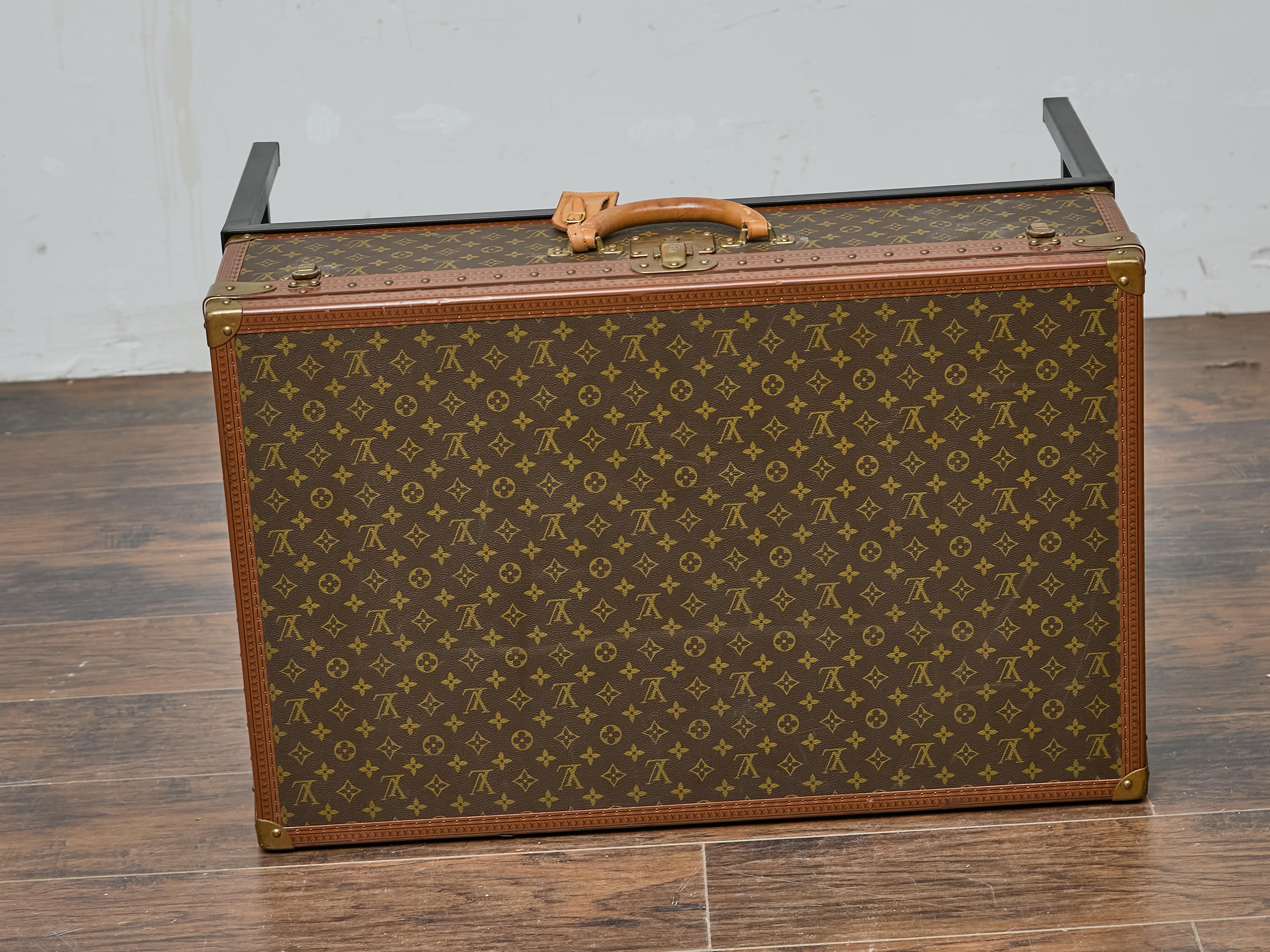 Louis Vuitton Vintage Trunk Made into Coffee Table on Custom Base For Sale 1