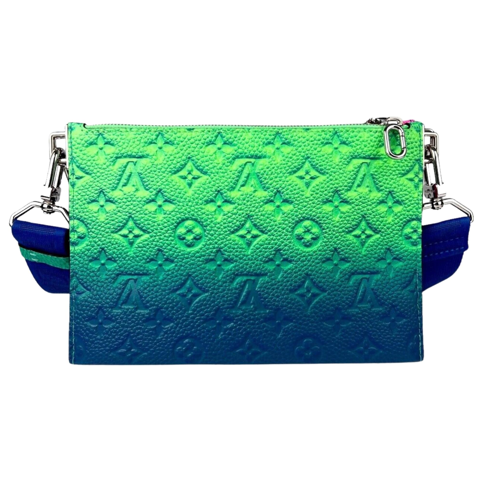 This trio messenger pouch bag from Louis Vuitton Spring/Summer 2022 Collection by Virgil Abloh is made of monogram embossed calfskin leather in neon colors. The bags feature Taurillon Illusion leather construction with fluorescent shades of blue,