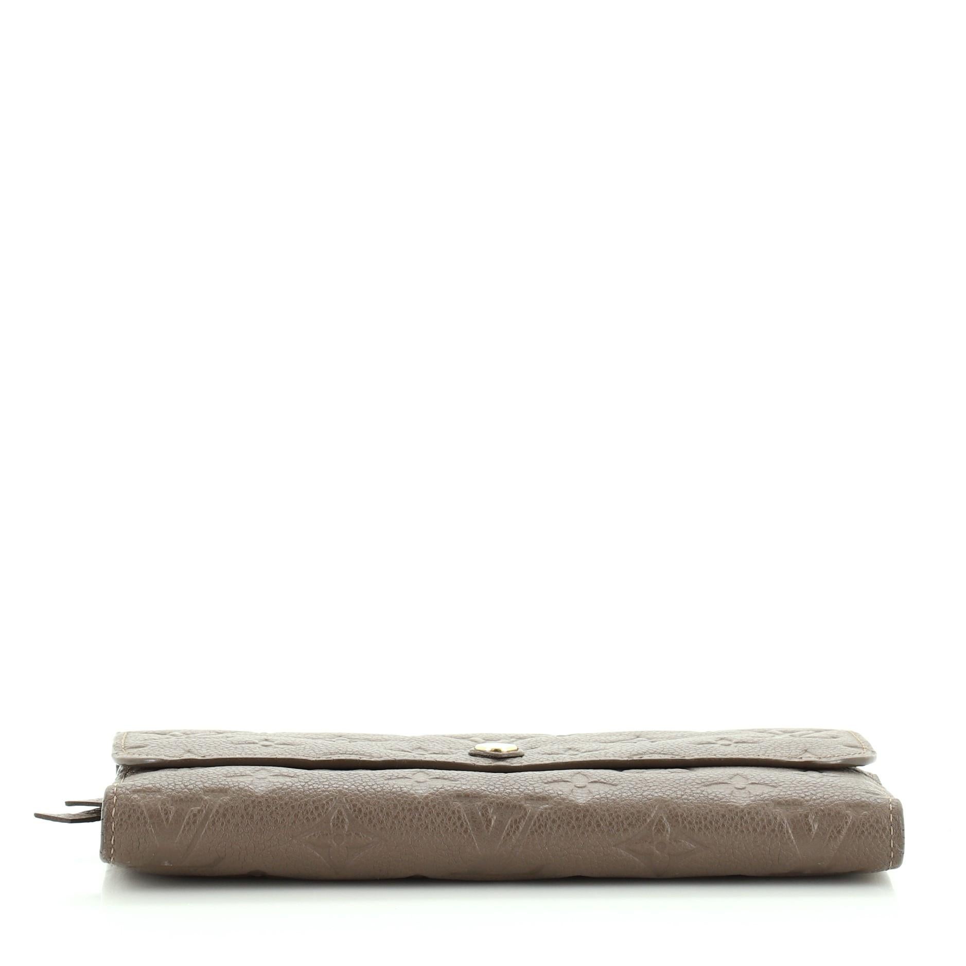 Louis Vuitton Virtuose Wallet Monogram Empreinte Leather In Good Condition In NY, NY